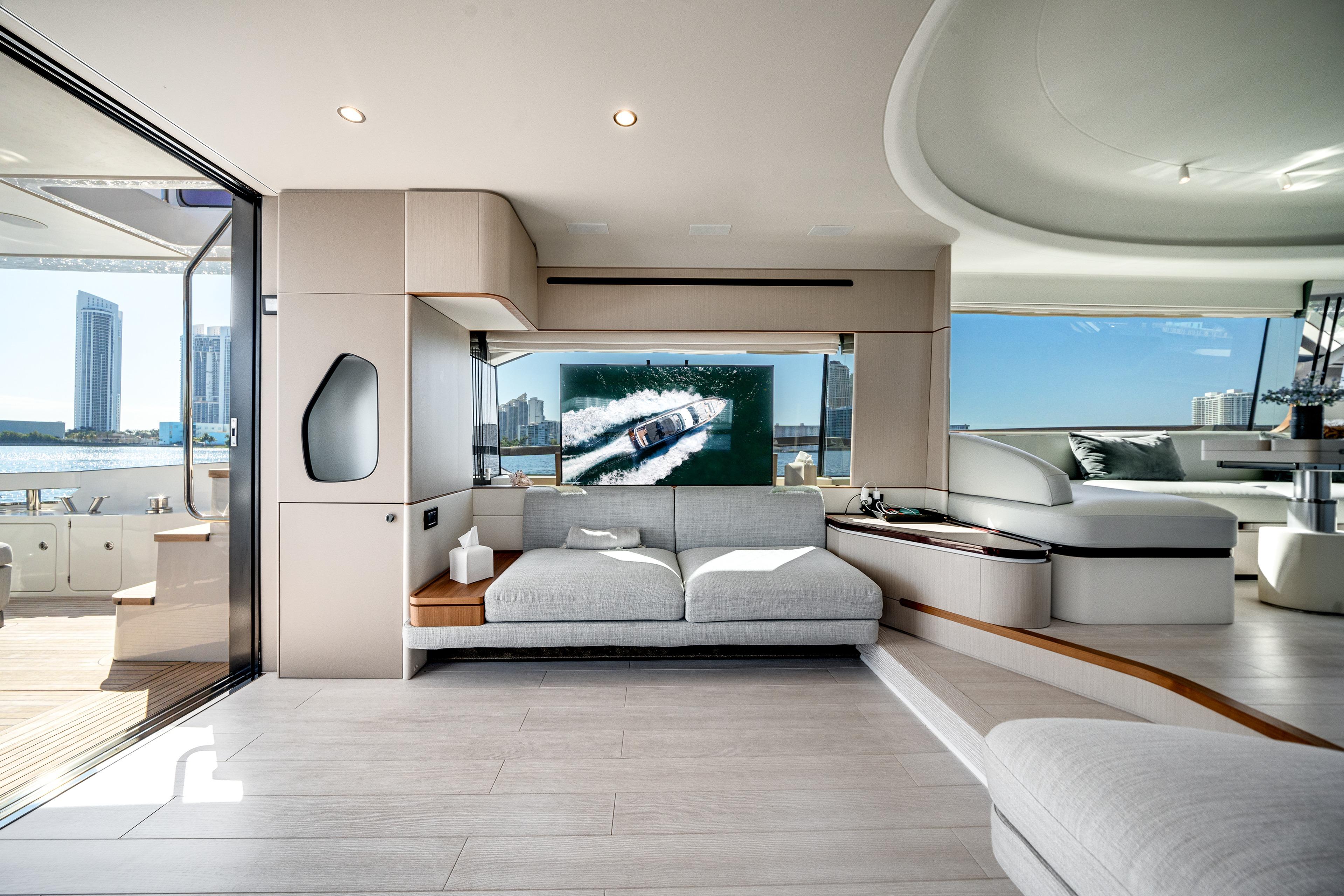 Luxurious interior of 2023 Azimut Fly 68 yacht with modern design and waterfront view.