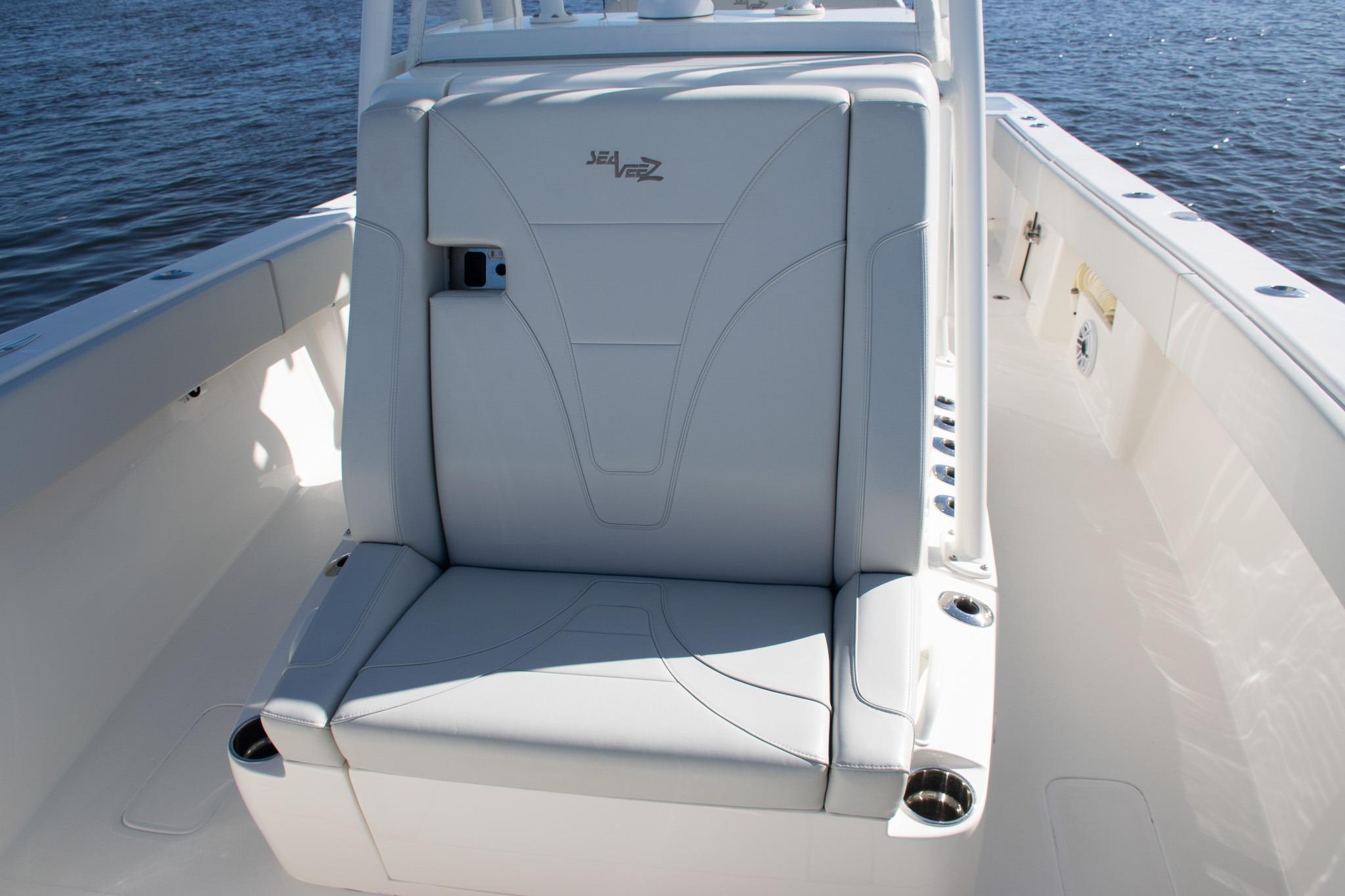 2022 SeaVee 322Z boat with sleek seating and cup holders on deck.