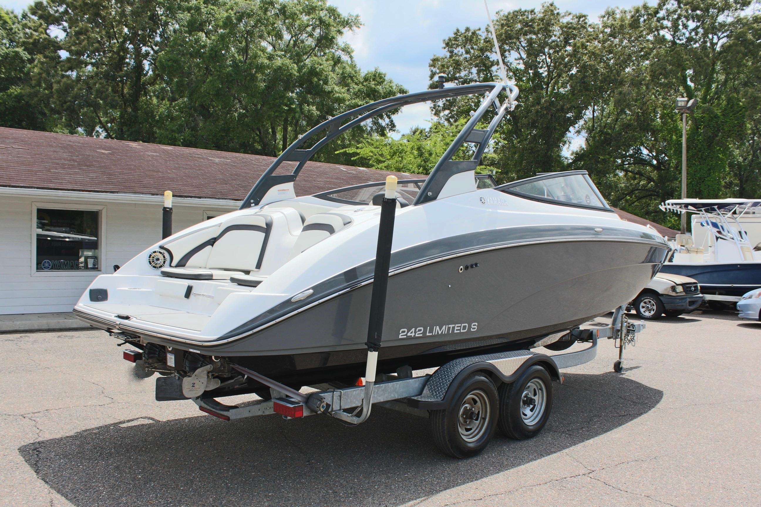 2016 Yamaha Boats 242 Limited S on trailer, parked outdoors.