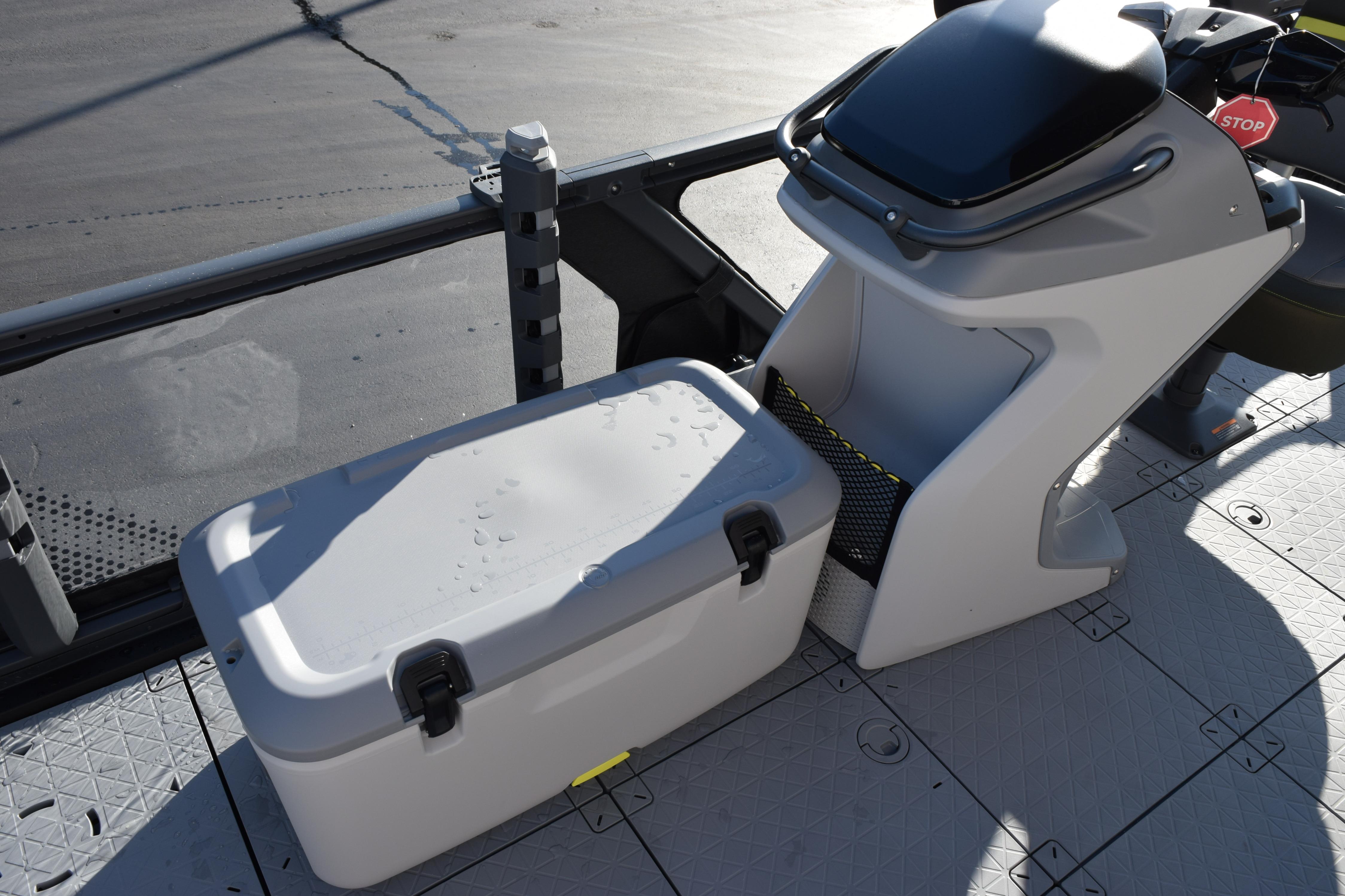 2026 Sea-Doo Switch Fish 21 interior with storage compartment and control console.