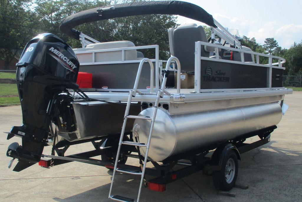 2026 Sun Tracker Bass Buggy 16 XL Select pontoon boat with Mercury outboard motor.