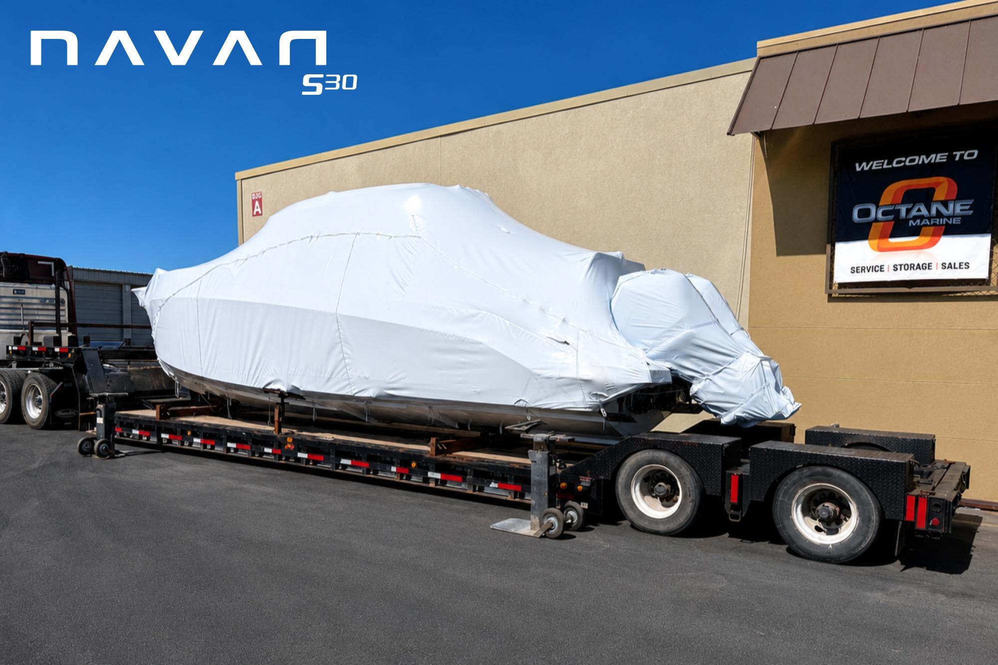 Covered Navan S30 boat on trailer outside Octane Marine, 2026 model.