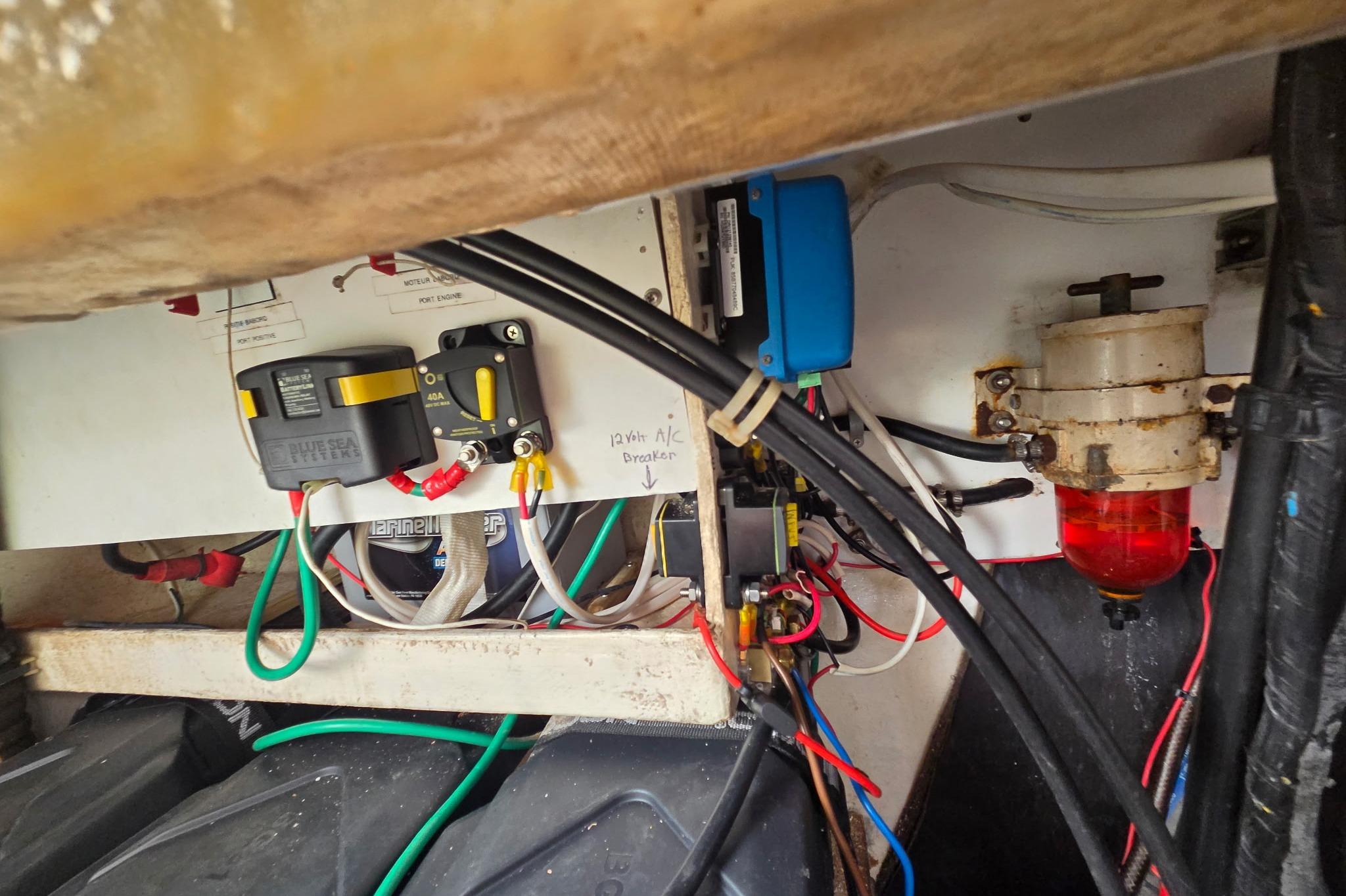 Electrical components and wiring inside a 2000 Fountaine Pajot Maryland 37 boat.