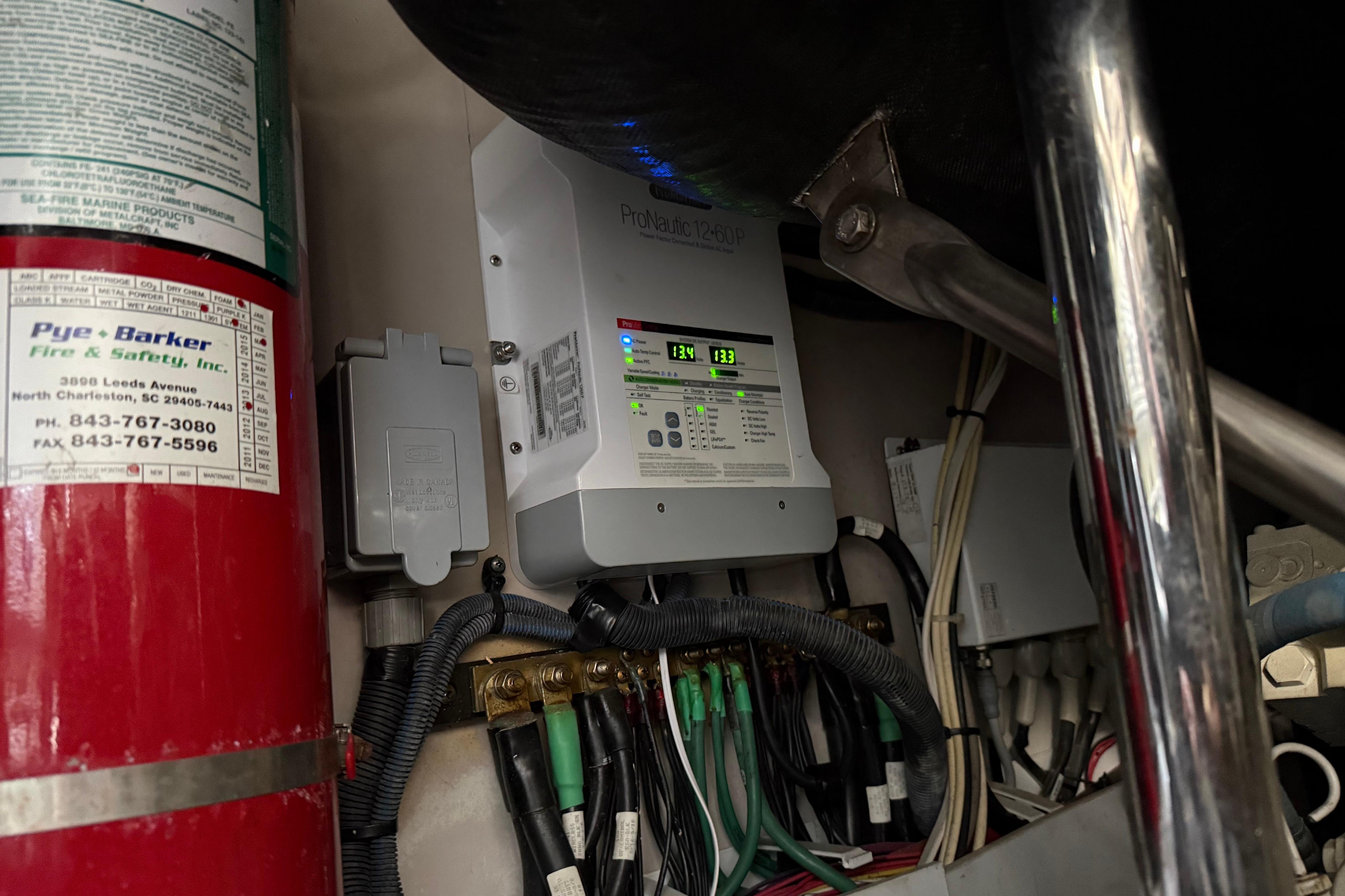 Electrical panel and fire extinguisher on 2008 Sea Ray 47 Sedan Bridge yacht.