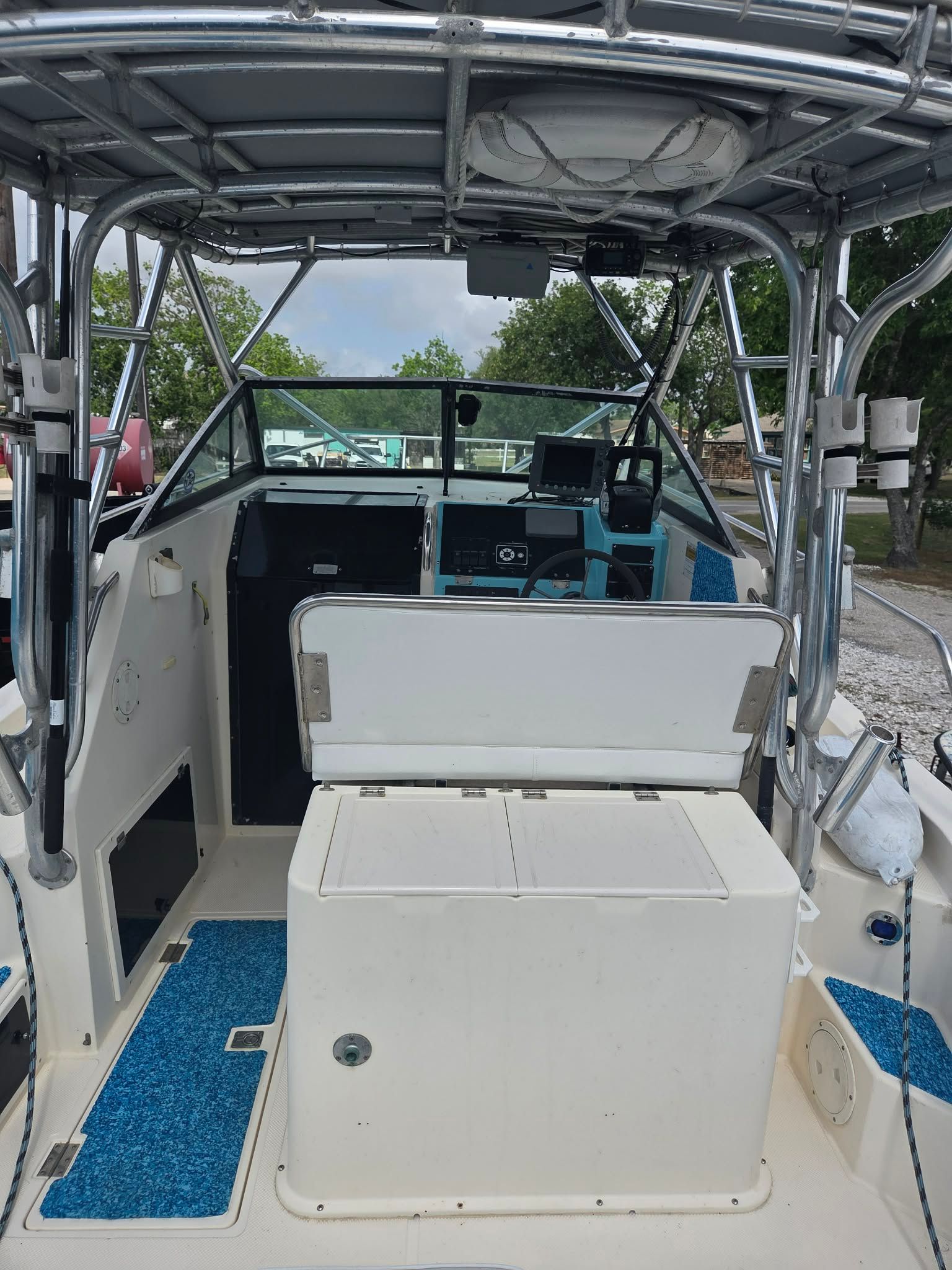 Interior view of a 1997 Sea Cat SLC 5 boat with helm console.