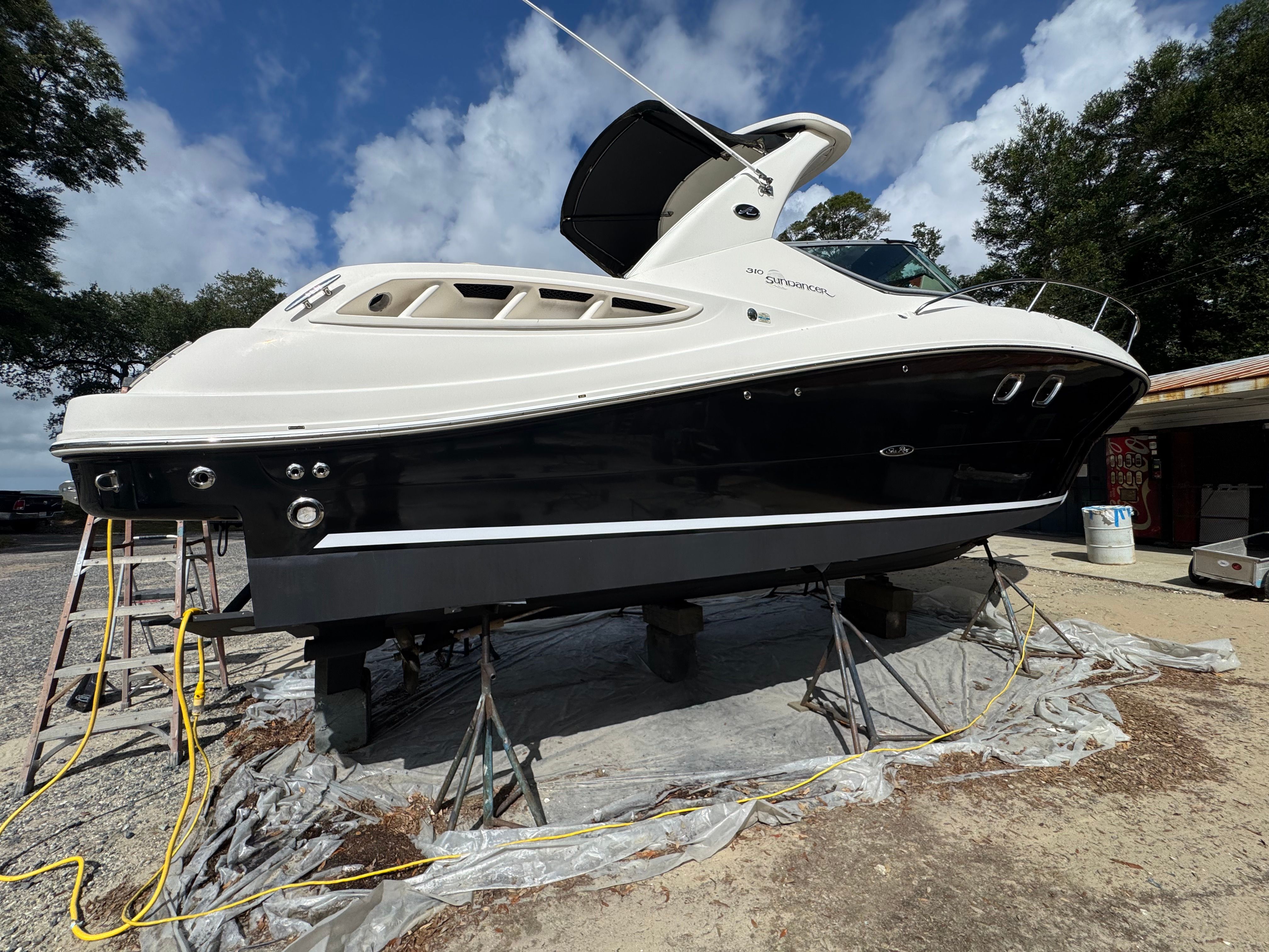2007 Sea Ray Sundancer 310 yacht elevated outdoors.