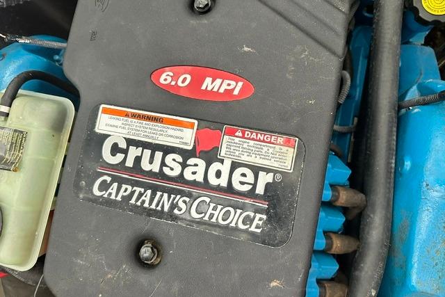 Engine of 2004 Carver 360 Mariner with Crusader Captain's Choice 6.0 MPI label.