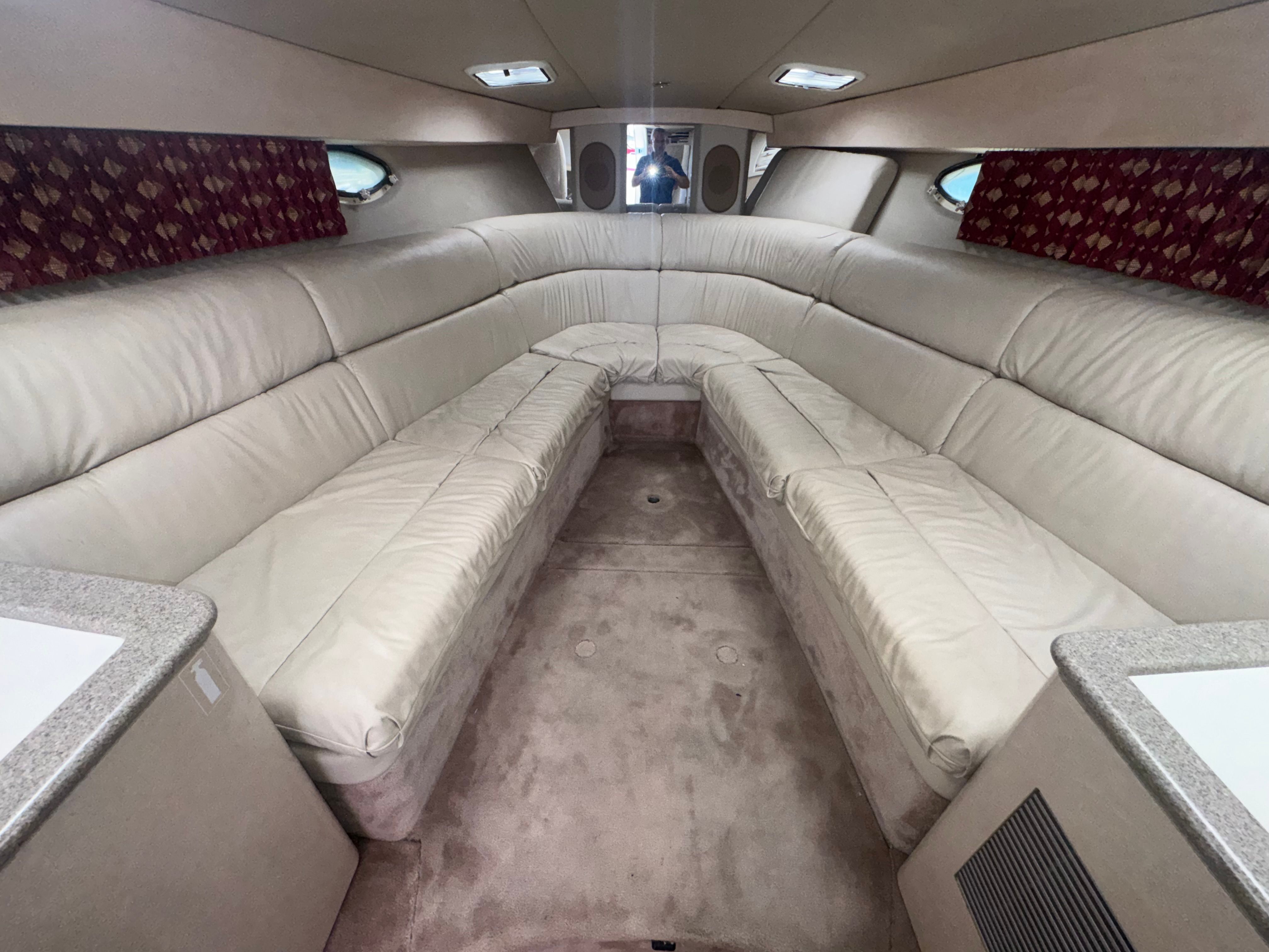 Interior of a 2001 Formula 37 SUPER SPORT yacht with beige leather seating.