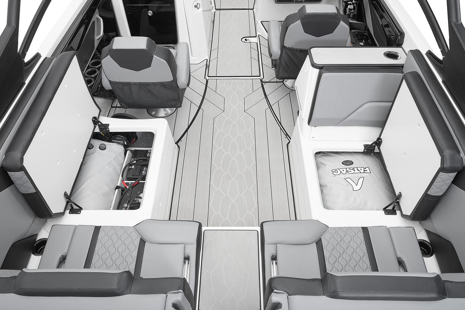 Manufacturer Provided Image: 2026 Yamaha Boats 255XE interior with open storage compartments and modern seating design.