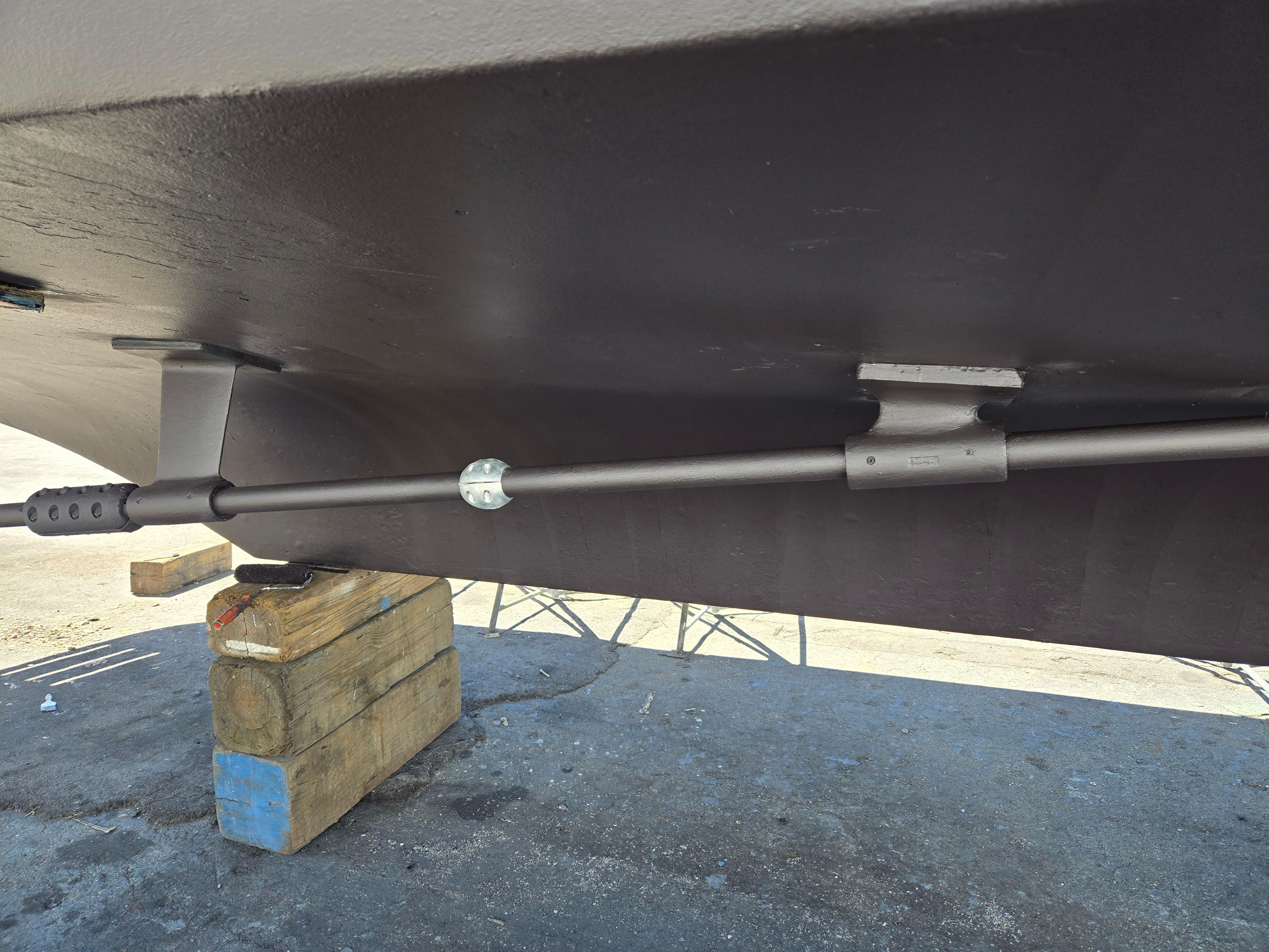 1986 Hatteras 53 Extended Deckhouse hull underside with stabilizer fin and support blocks.