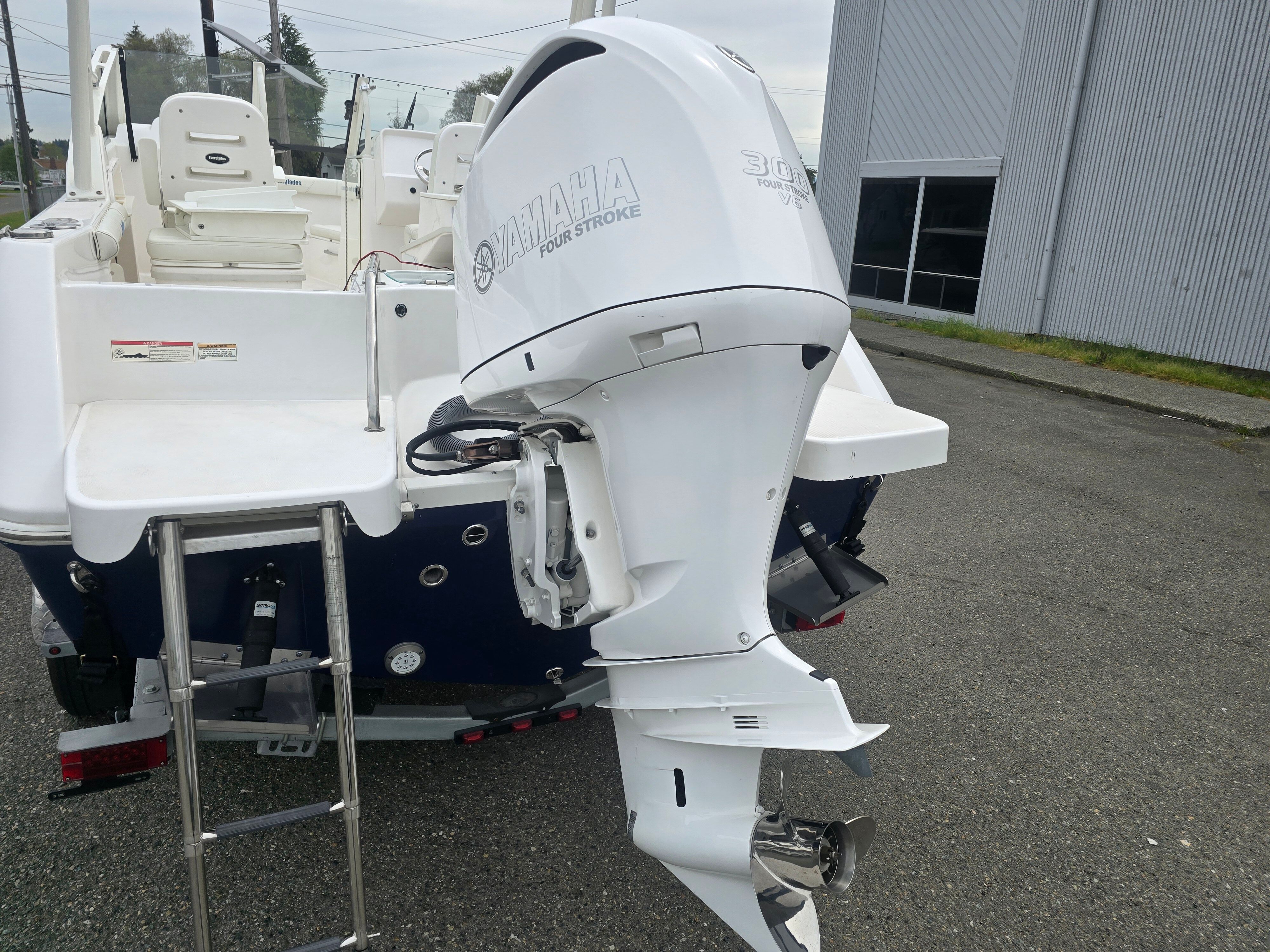 A 2017 Everglades 230 Dual Console with a Yamaha outboard motor.