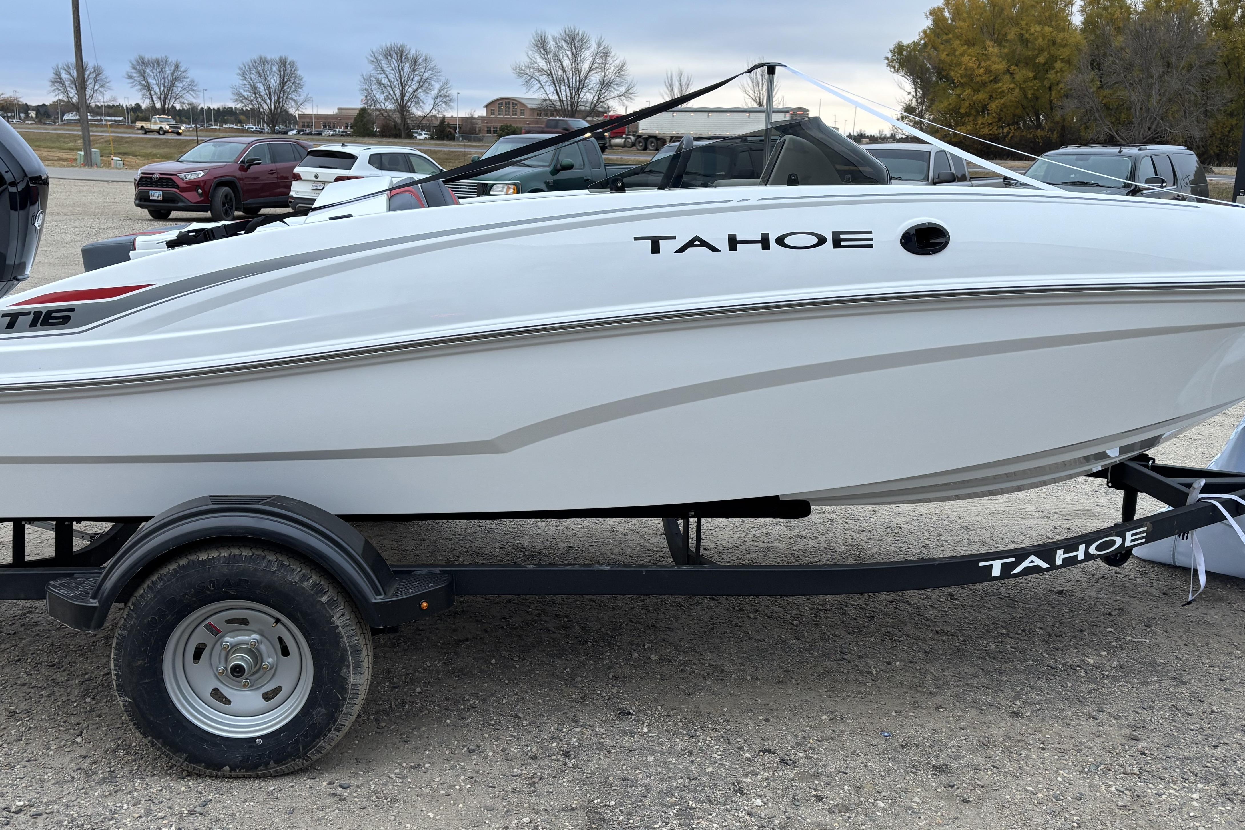 2026 Tahoe T16 boat on trailer in parking lot.