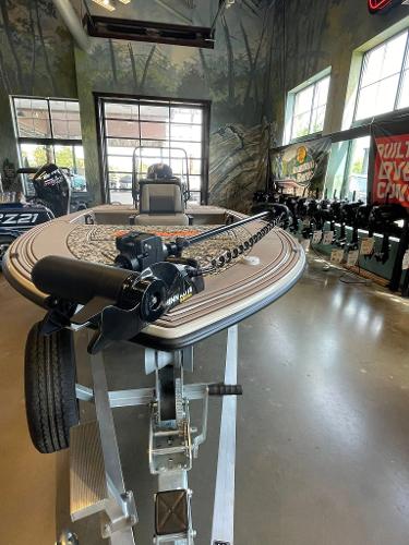 2025 Mako 18 Pro Skiff Backwater Edition displayed in showroom, featuring advanced trolling motor.