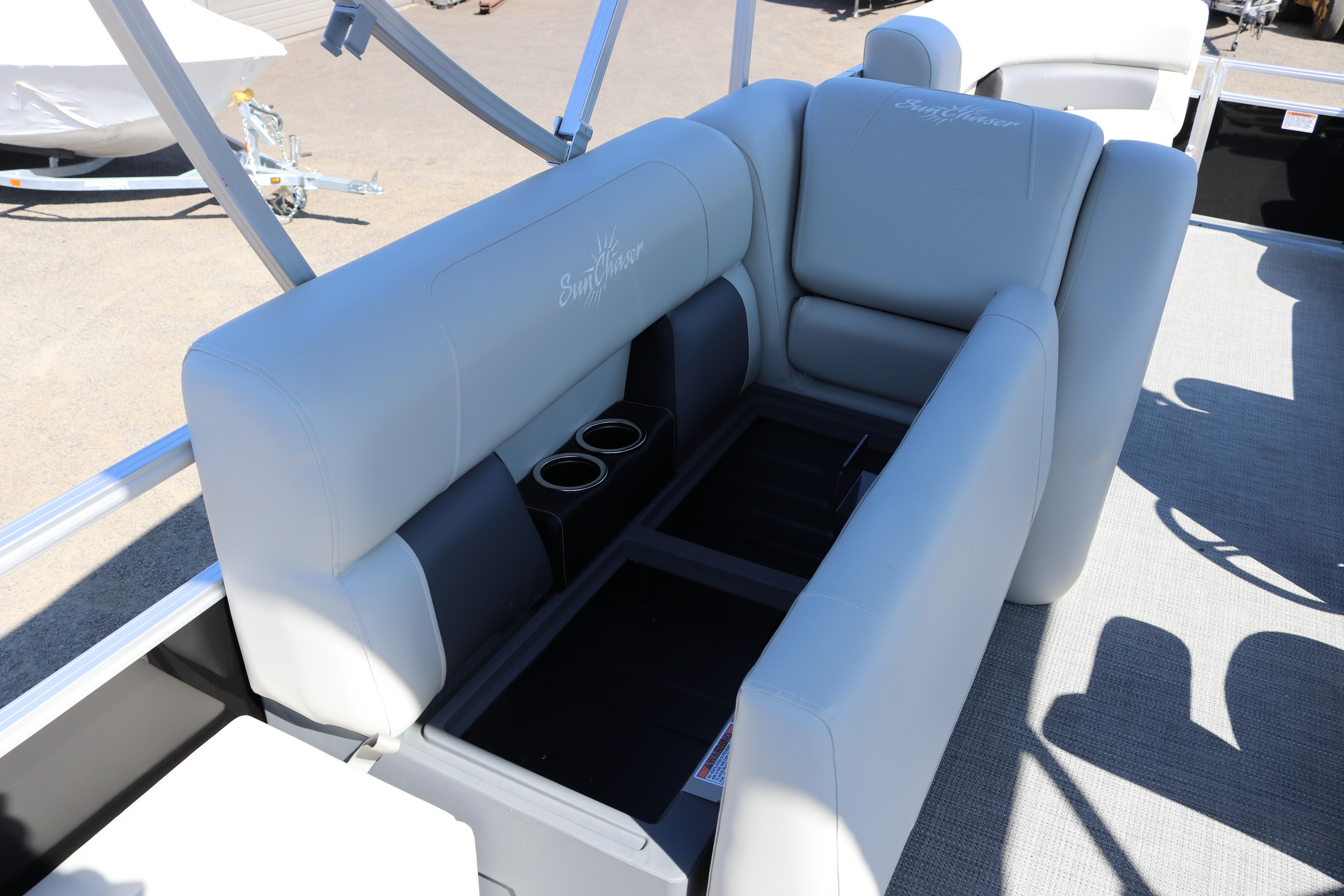 2025 SunChaser Vista 20 Fish boat interior with gray seating and cup holders.