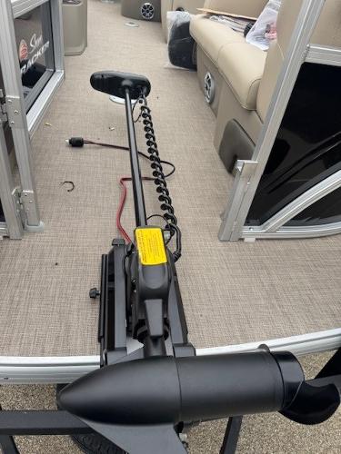 2025 Sun Tracker SportFish 22 DLX pontoon boat interior with trolling motor.