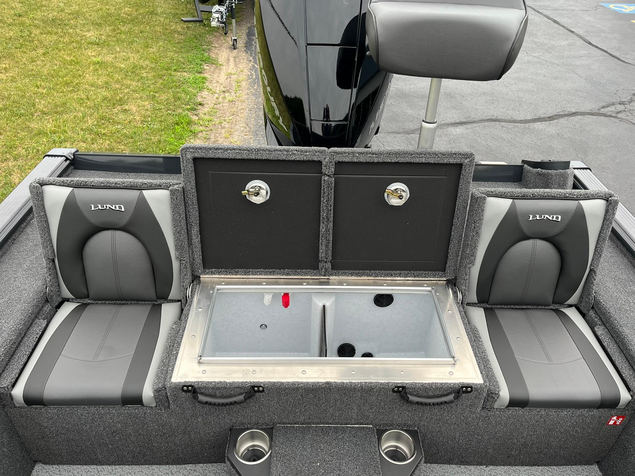 2026 Lund 1875 Pro-V Bass XS boat interior with seating and storage compartments.