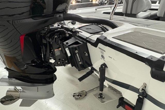 2026 Nitro ZV20 Sport Pro boat engine and transom detail in showroom.