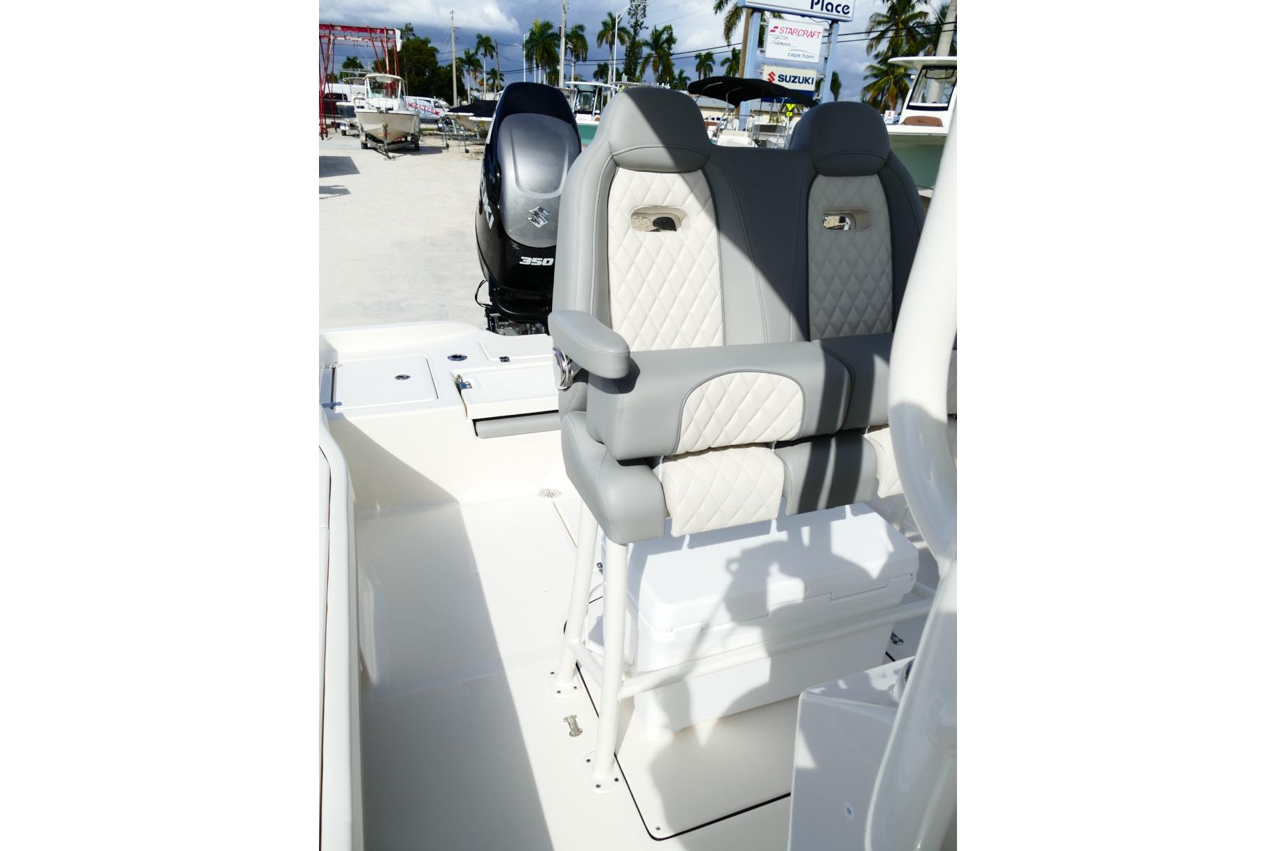 2026 Avenger AV26 boat interior with dual seats and Suzuki 350 outboard motor.