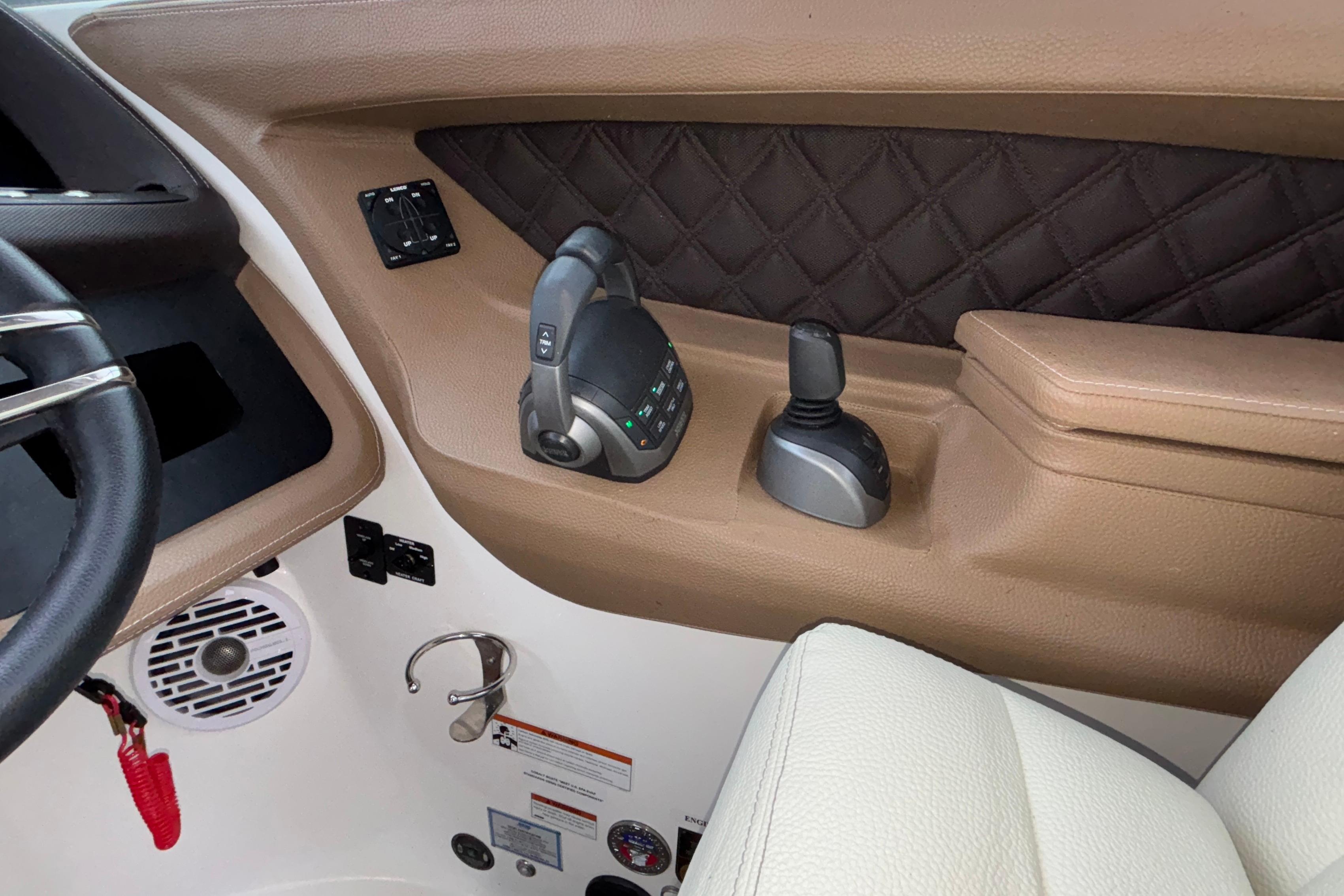 Interior of 2022 Cobalt R35 boat with steering and control panel.