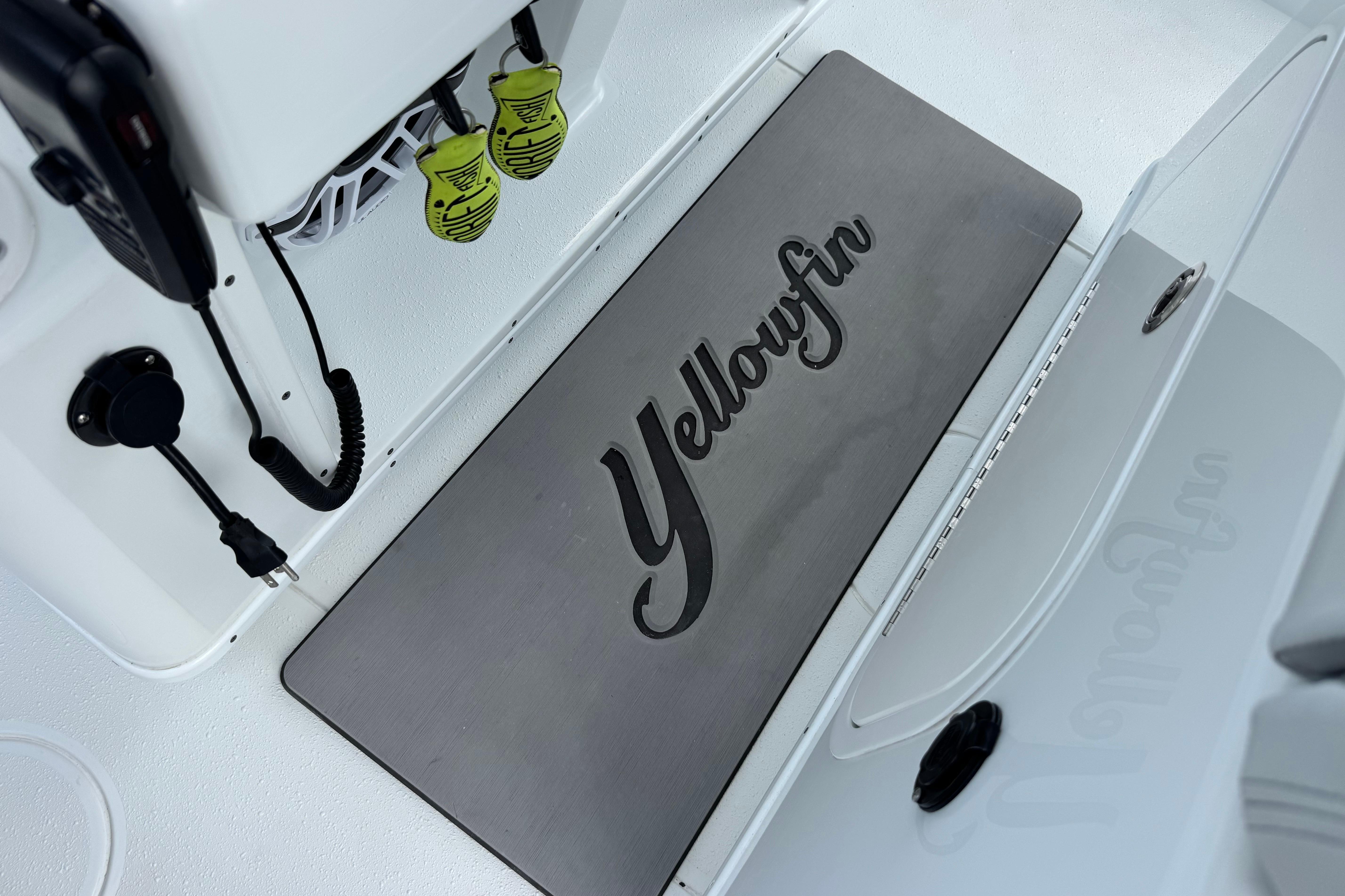 2022 Yellowfin 32 Offshore boat interior with branded mat and equipment.