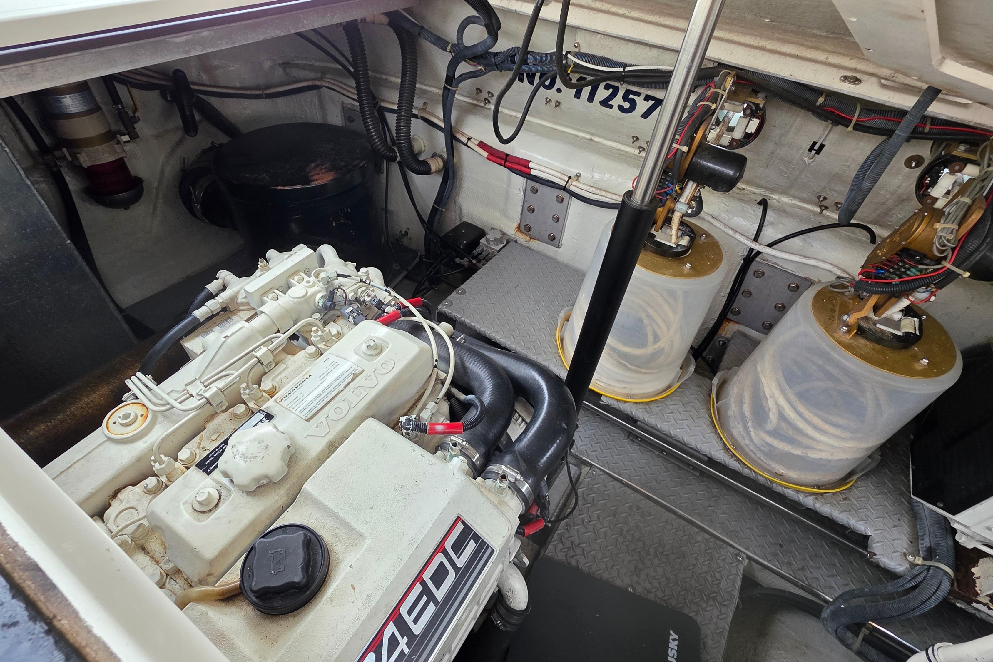 Engine room of 2002 Regal Commodore 4260 with Volvo Penta engine and mechanical components.