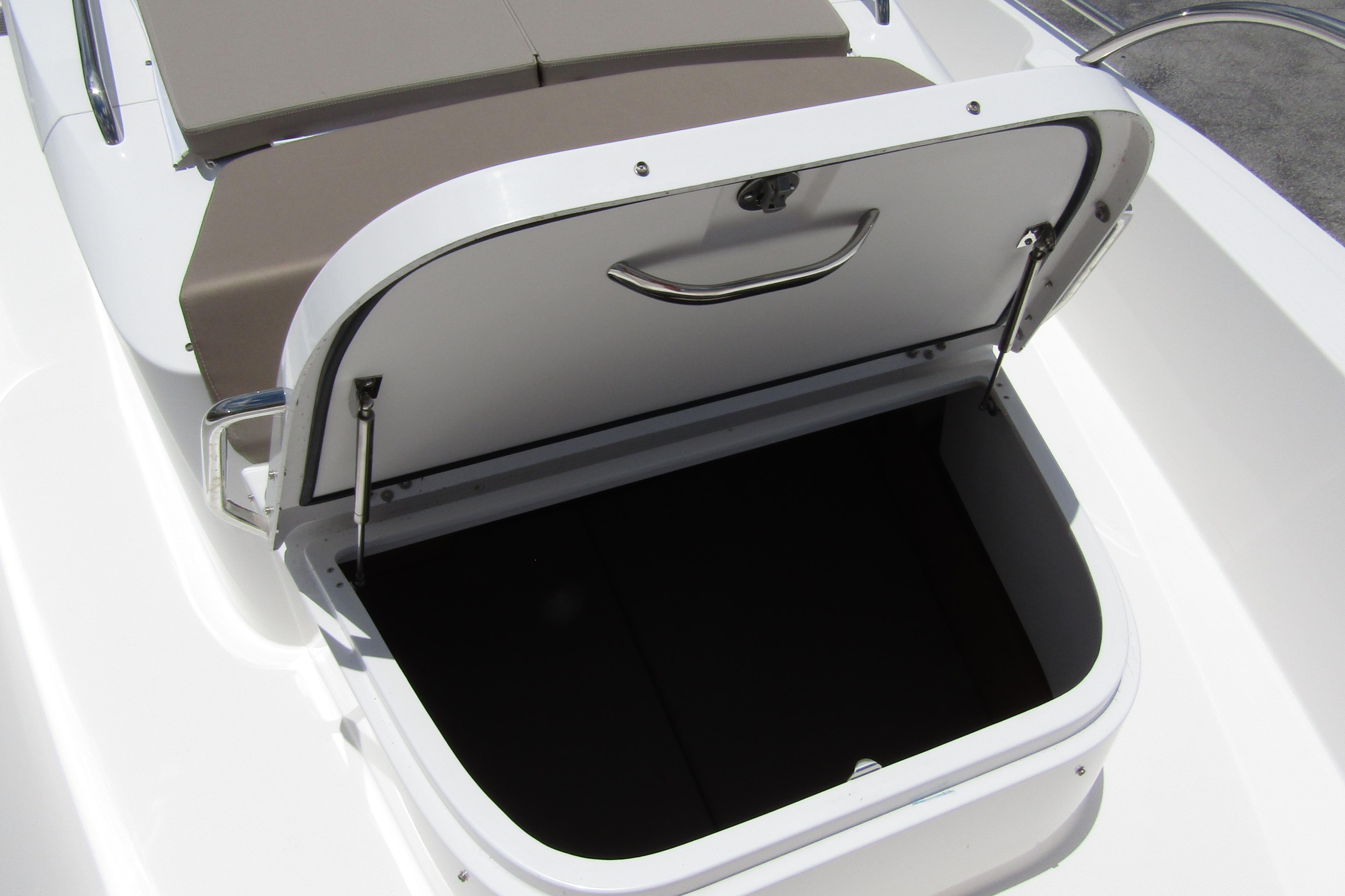 Open storage compartment on a 2025 Nimbus Tender 11 boat.