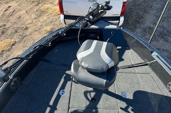 2026 Nitro ZV20 Pro boat interior with gray seat and fishing equipment.