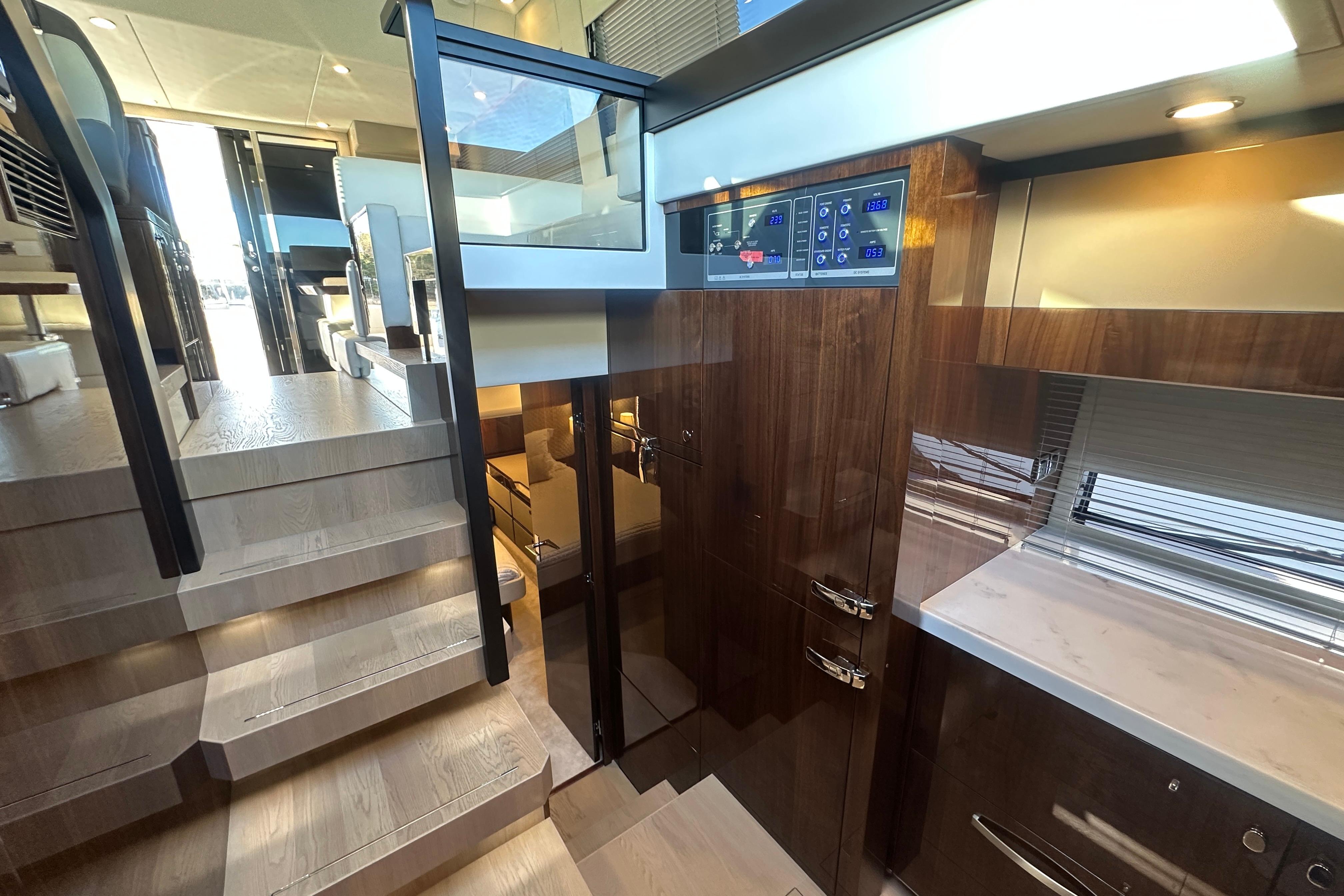 Luxurious interior of 2024 Fairline Squadron 50 yacht with modern design and wooden finishes.