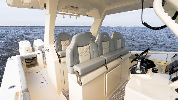 2025 Scout 425 LXF boat interior with luxurious seating on open water.
