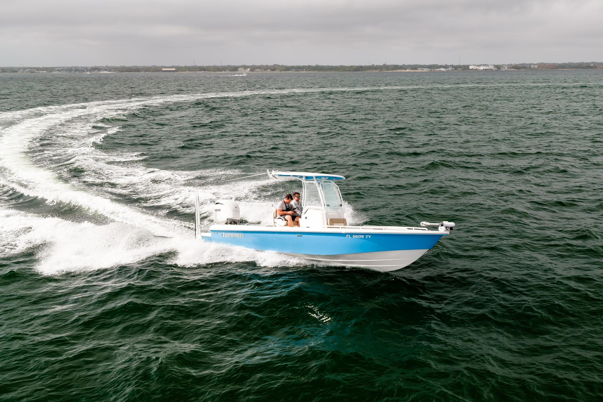 2023 Everglades 243 Center Console boat cruising on open water.