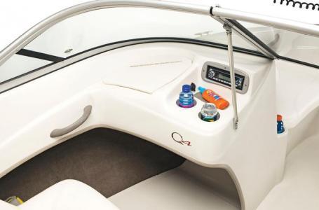 2012 Tahoe Q4 SS boat interior with dashboard and storage compartments.