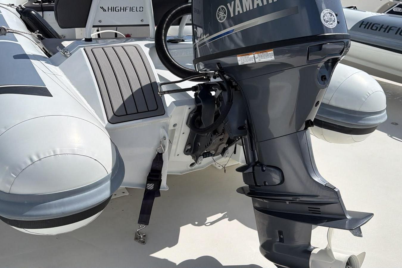 2022 Highfield Sport 420 boat with Yamaha outboard motor, docked on a sunny day.