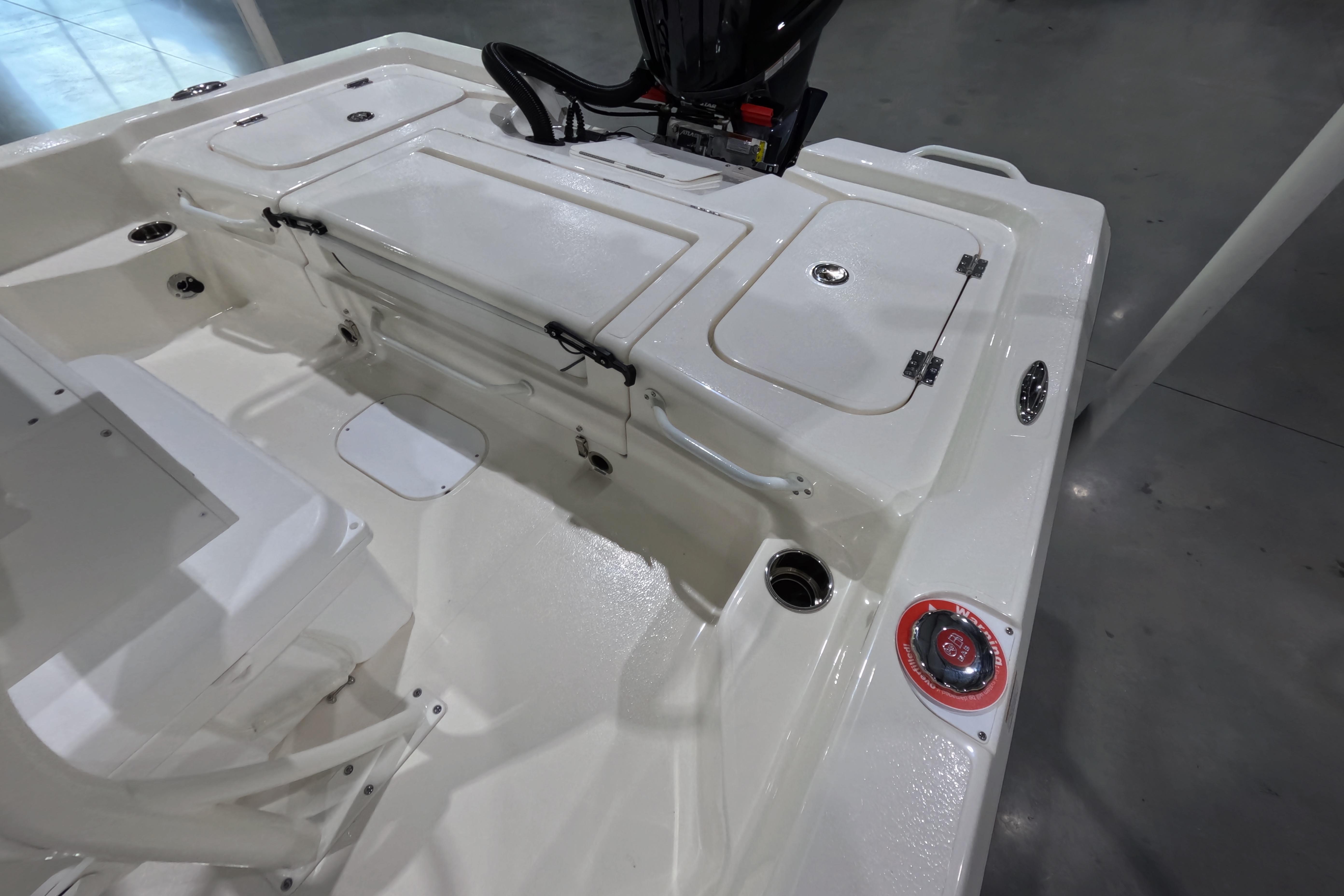 2026 Skeeter boat interior with storage compartments and seating, showcasing sleek design.