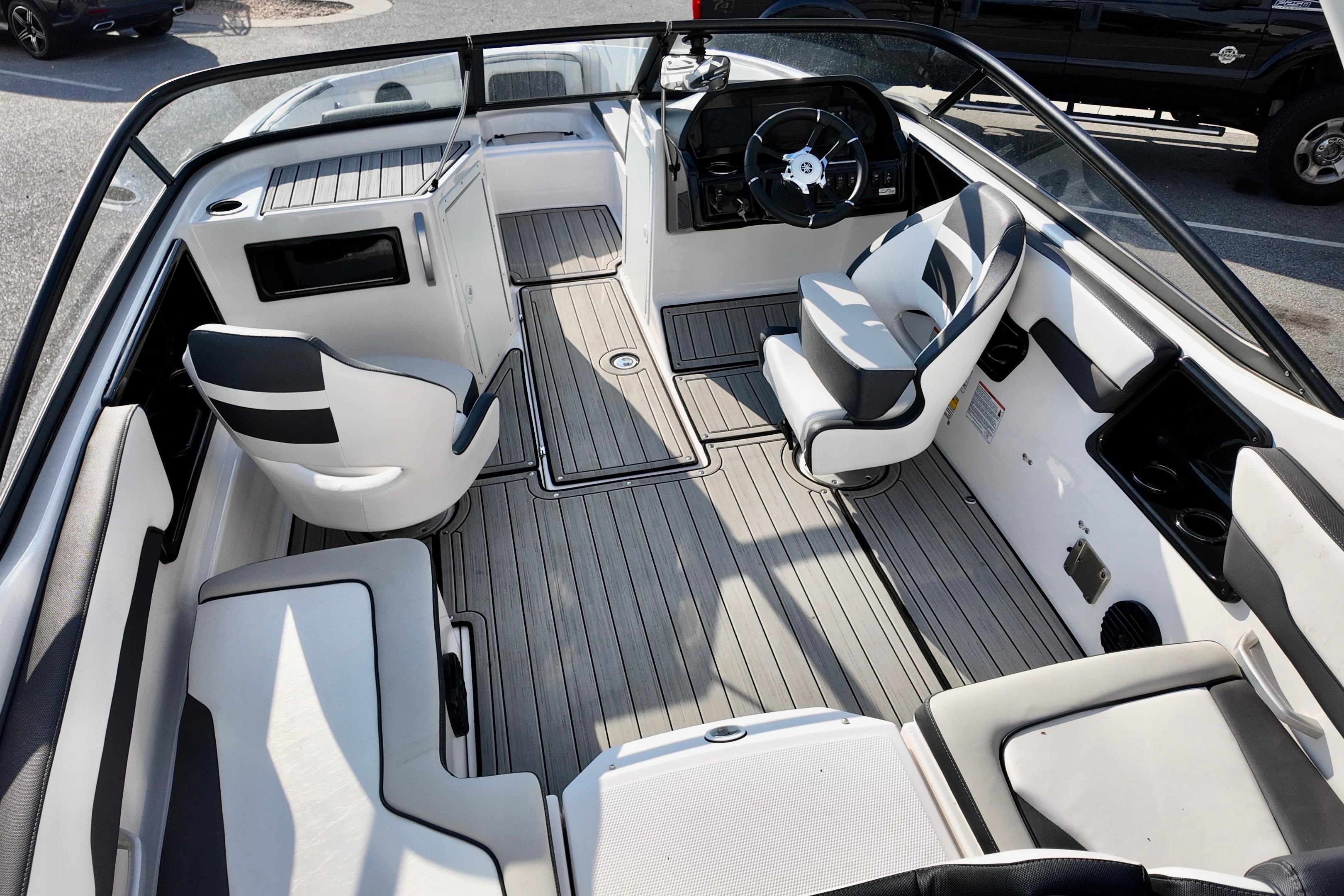 2023 Yamaha 195S boat interior with sleek seating and modern dashboard design.