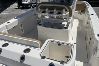 2023 Trophy T24 CC boat interior with seating and storage compartments.