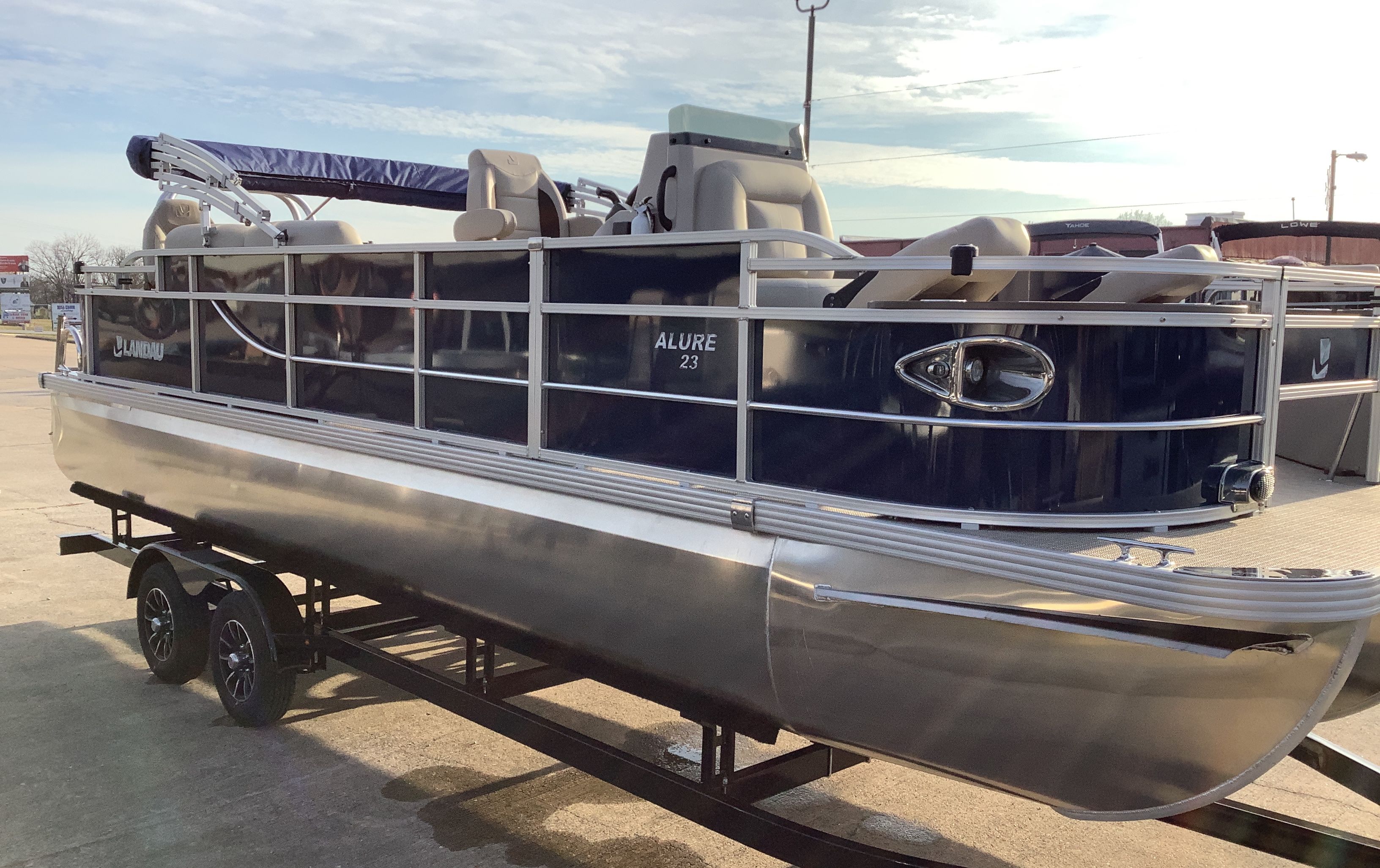 2026 Landau Alure 23CC Fish boat on trailer.