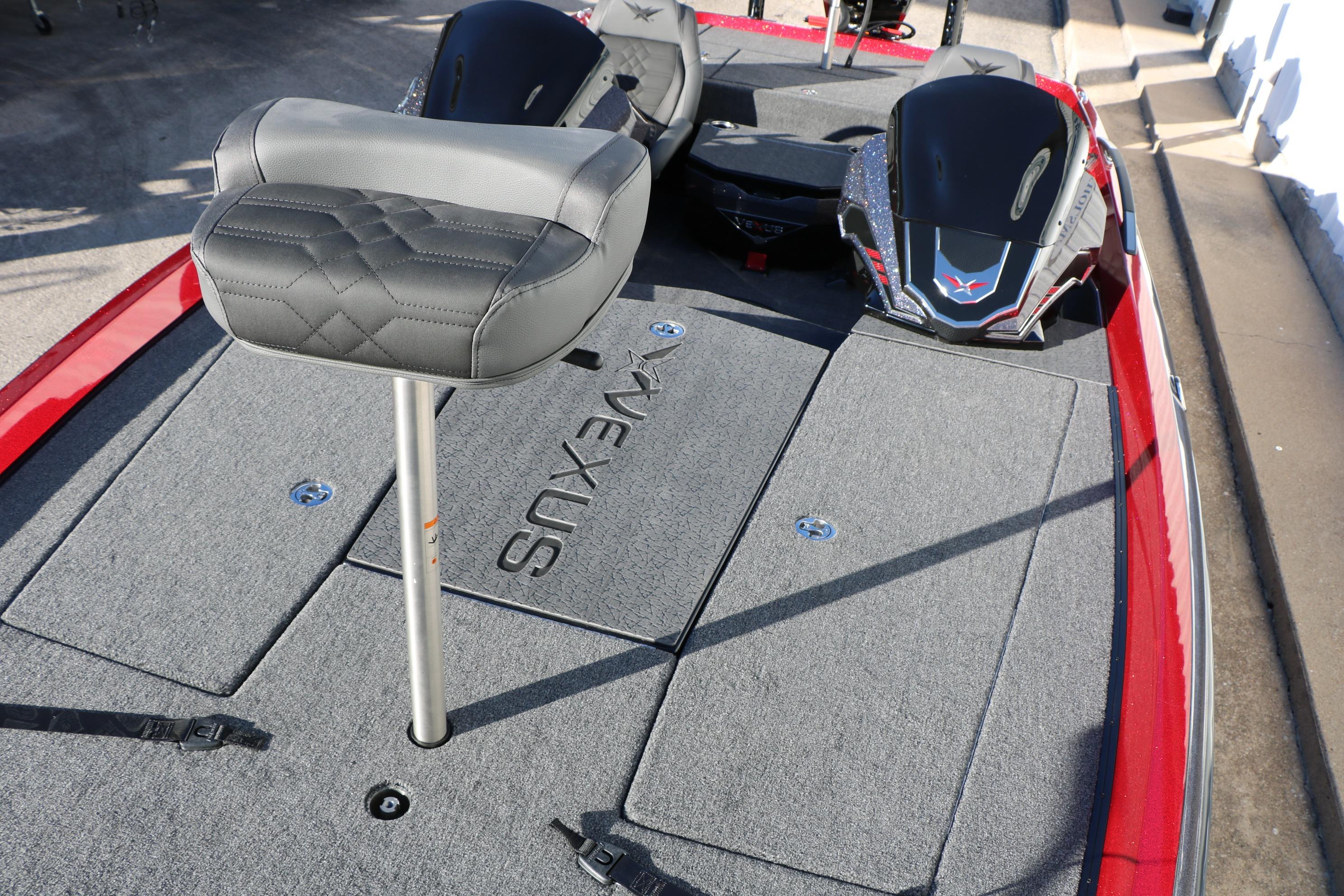 2026 Vexus VXs21 boat interior with gray seating and carpeted deck.