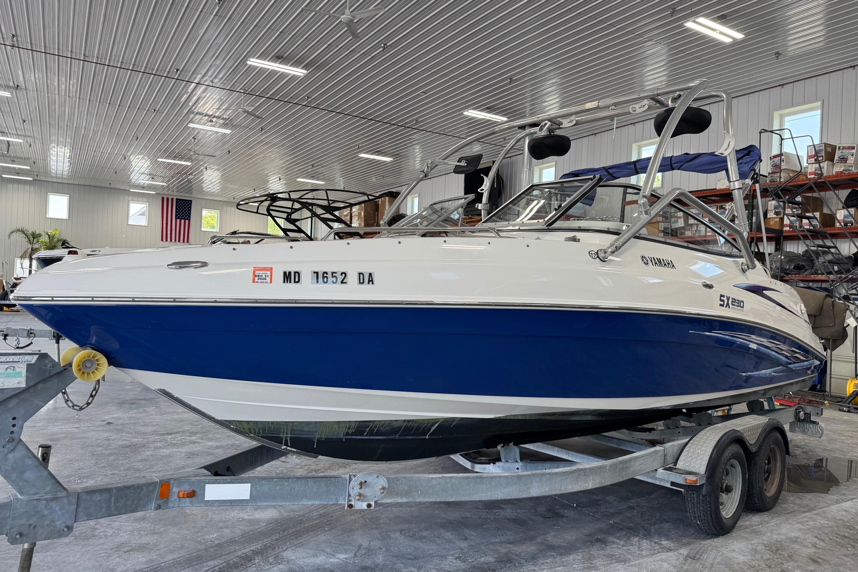 2007 Yamaha Boats SX230 HO on trailer in indoor storage facility.