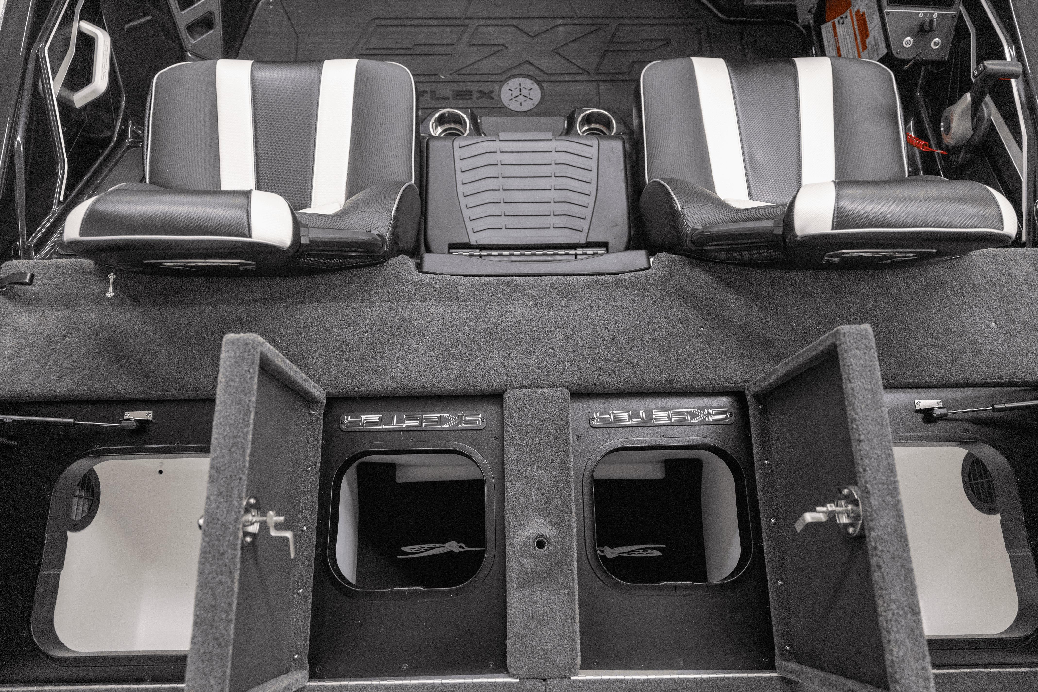 Interior of 2026 Skeeter FXR21 FLEX boat with storage compartments and seating.