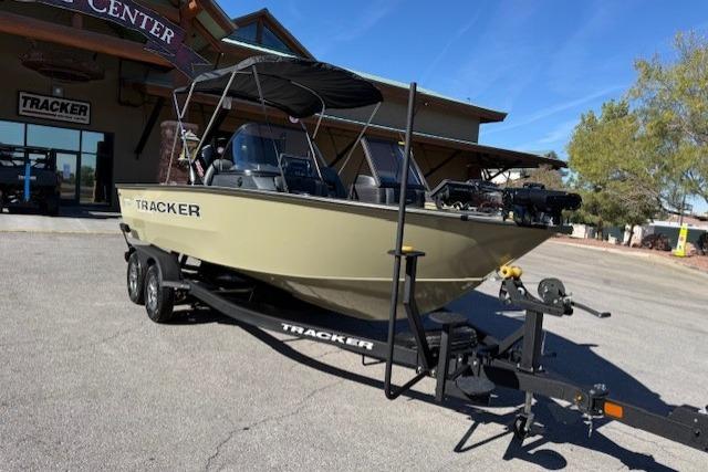 2026 Tracker Targa V-19 WT boat on trailer outside dealership.