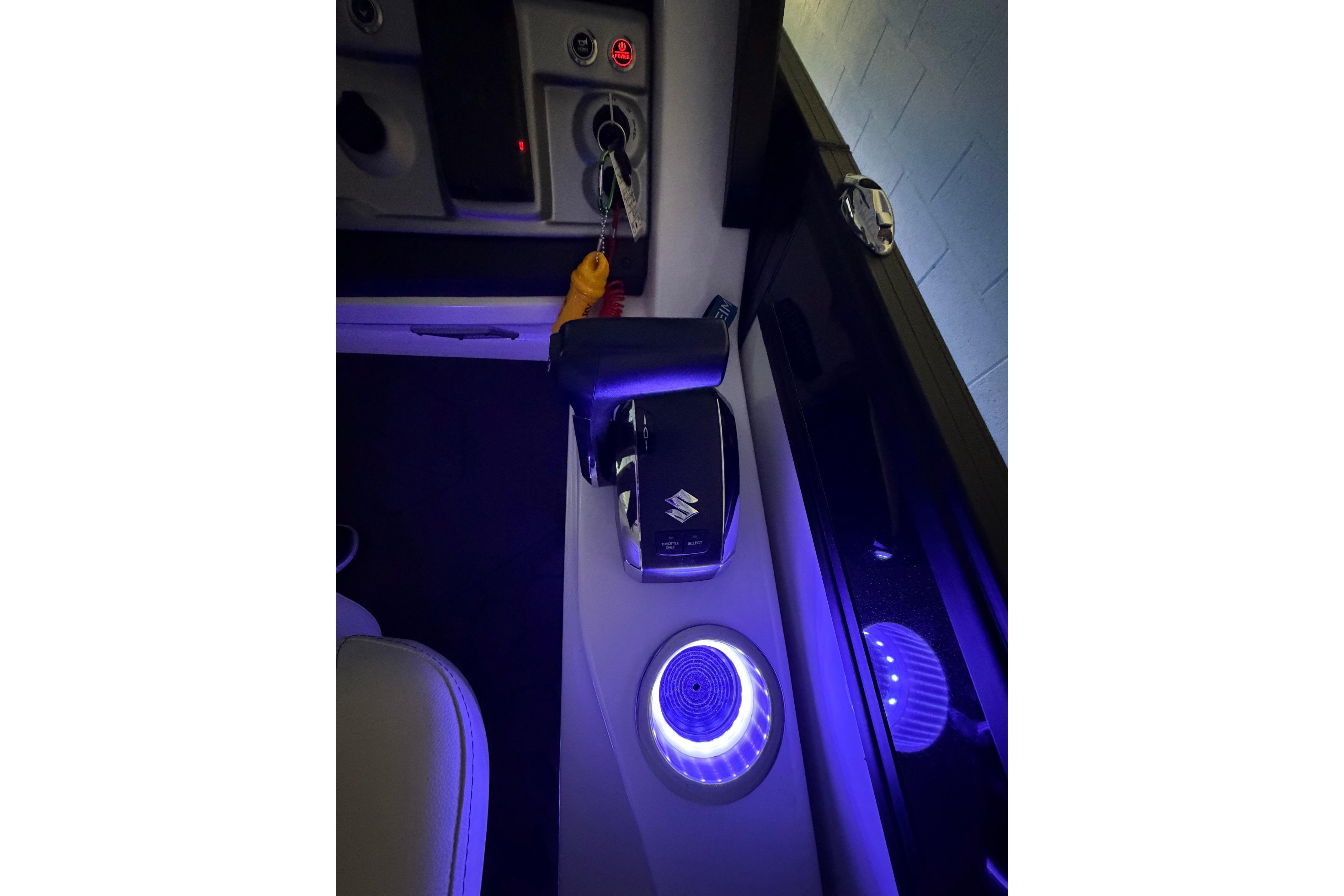 Interior of 2026 South Bay 525SB2 with illuminated controls and key ignition.