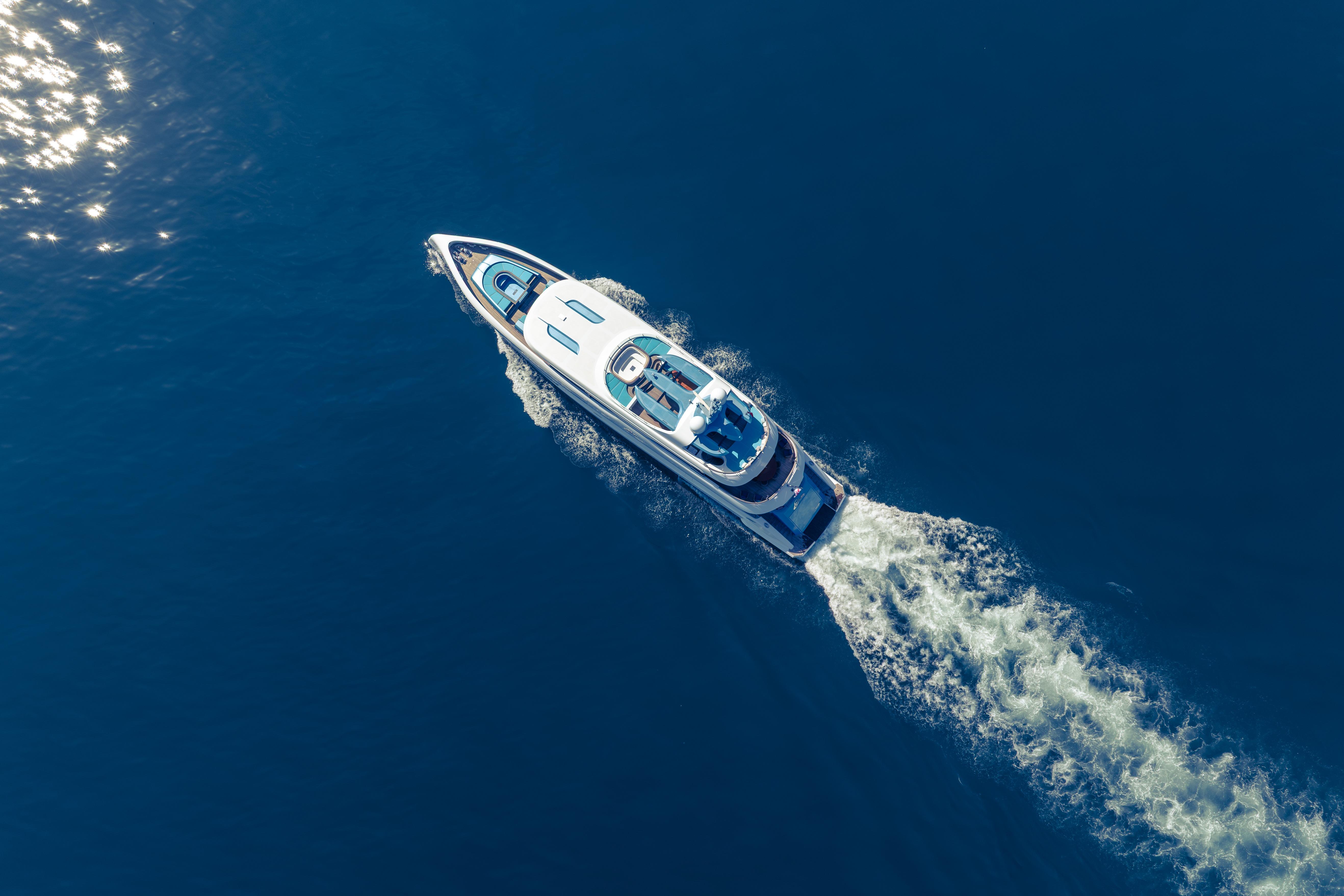 Aerial view of 2014 Bilgin 147 yacht cruising on open blue sea.