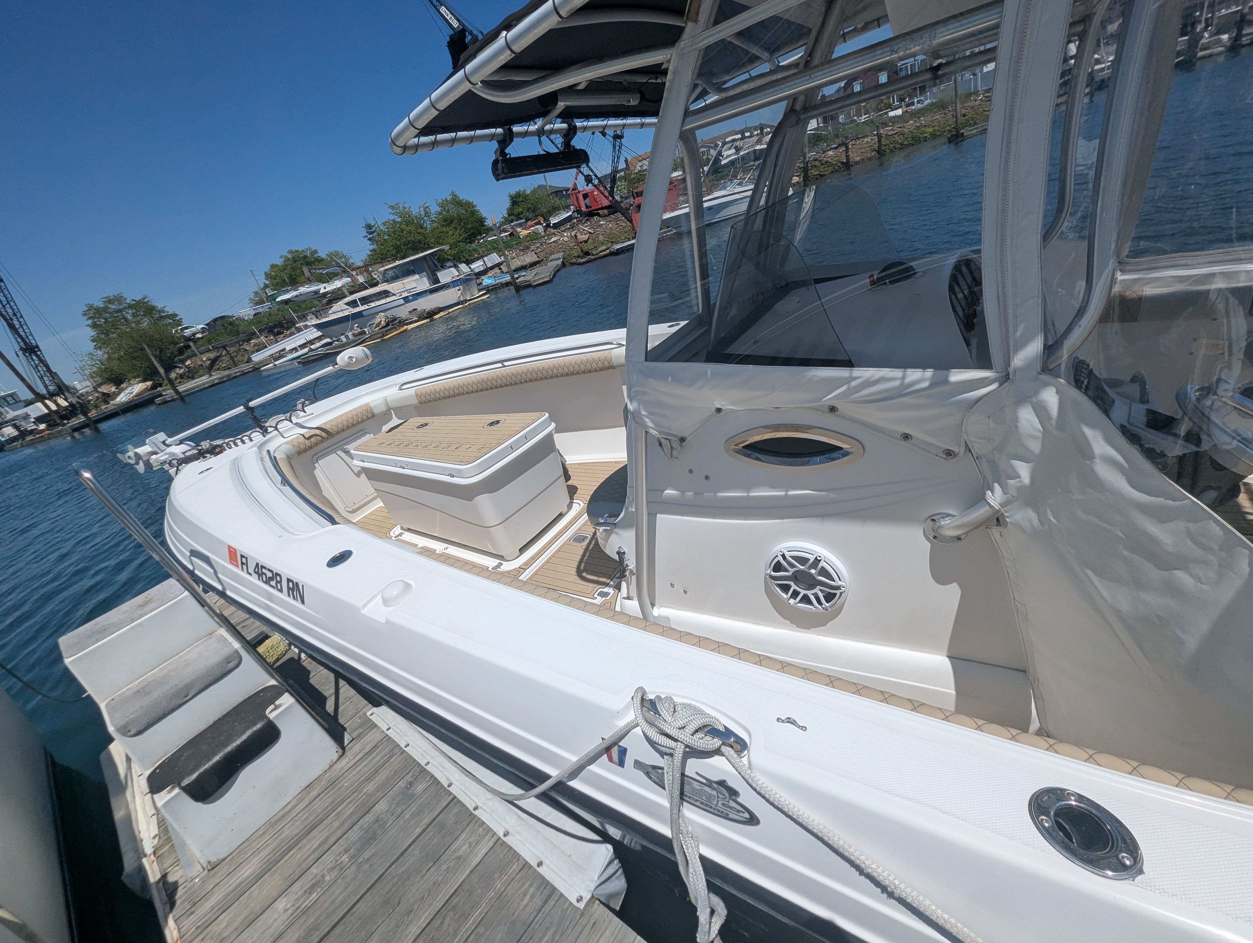 2005 Wellcraft 35 CCF boat docked on a sunny day.