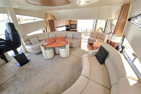 Luxurious interior of a 2005 Sunseeker Manhattan 66 yacht with elegant seating and modern design.