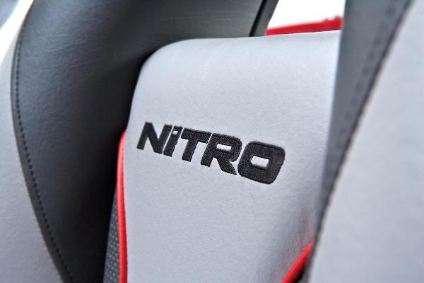Manufacturer Provided Image: Close-up of 2013 Nitro Z-8 seat with embroidered logo and red accents.