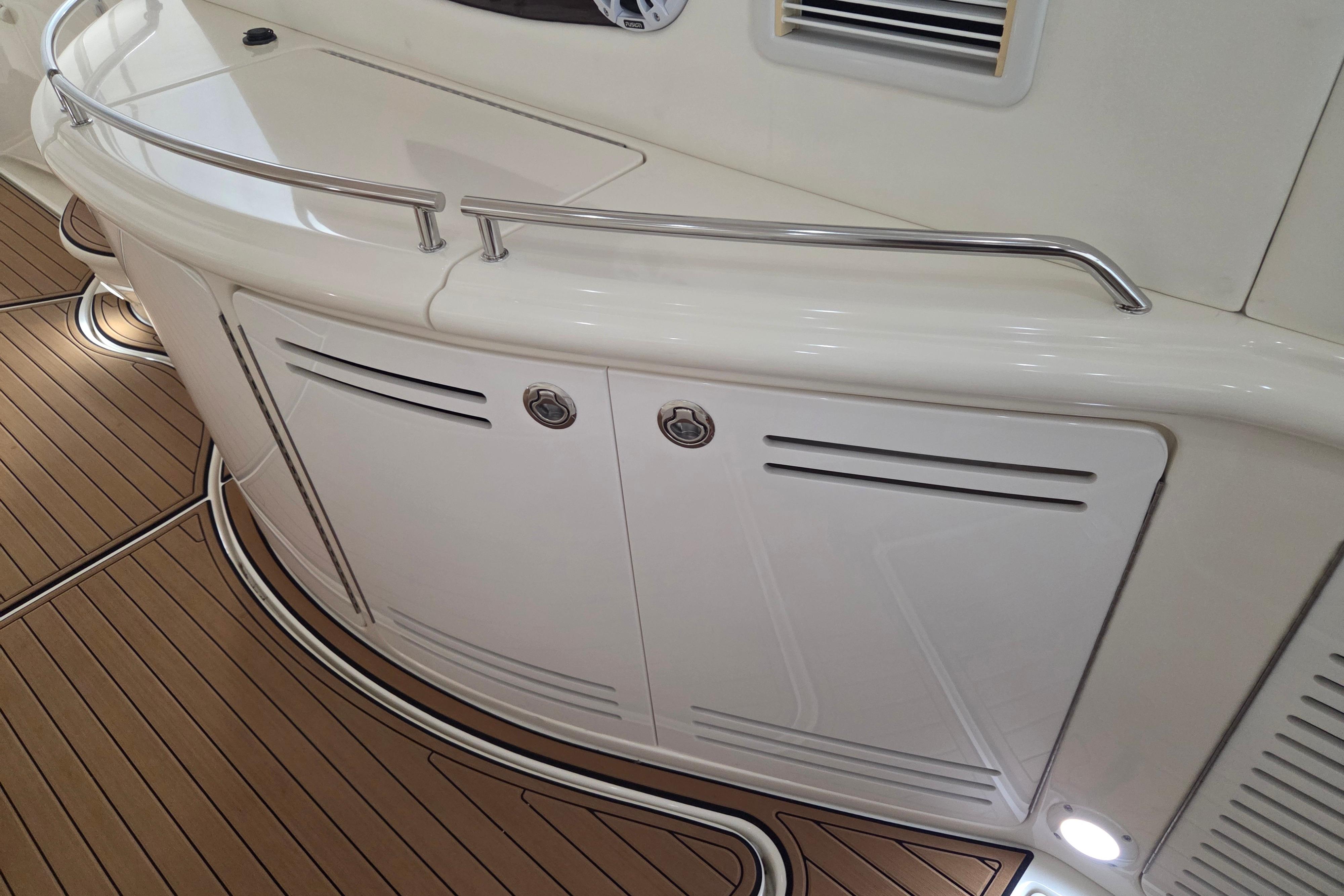 Interior view of a 2000 Sea Ray Sundancer 540 yacht with sleek design and wood flooring.