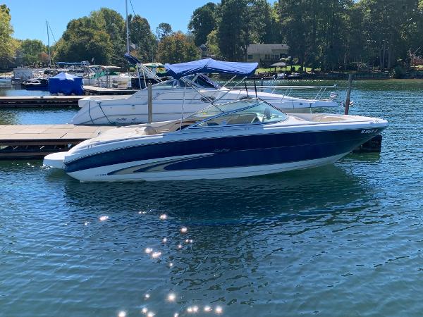 2000 Sea Ray 210 Bow Rider docked on a sunny day.