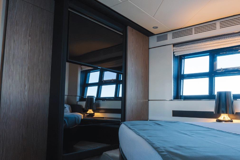Luxurious interior of 2020 Azimut 60 yacht with modern design and large windows.