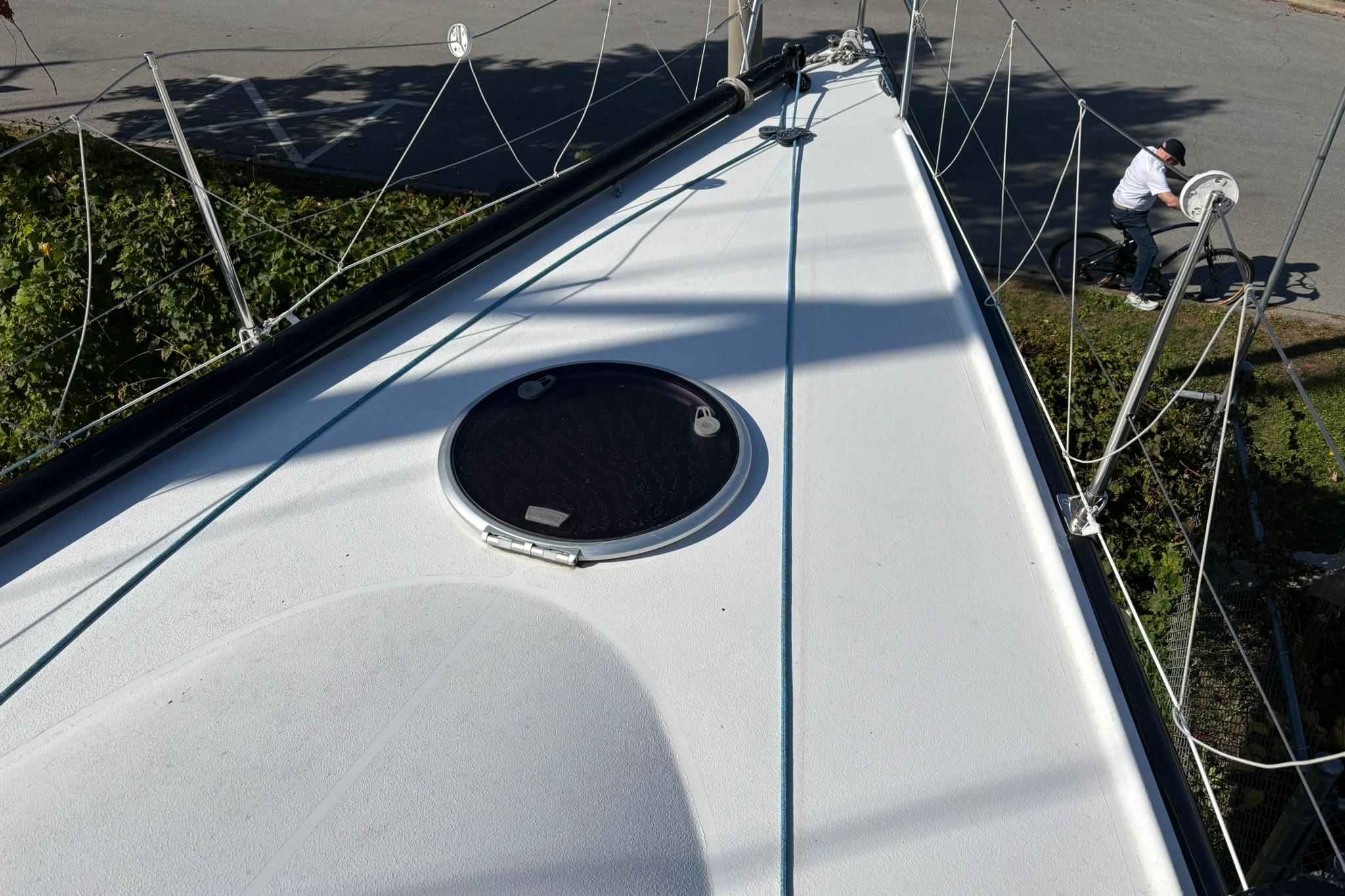 Deck view of a 1993 Nelson Marek 43 sailboat with visible rigging and hatch.