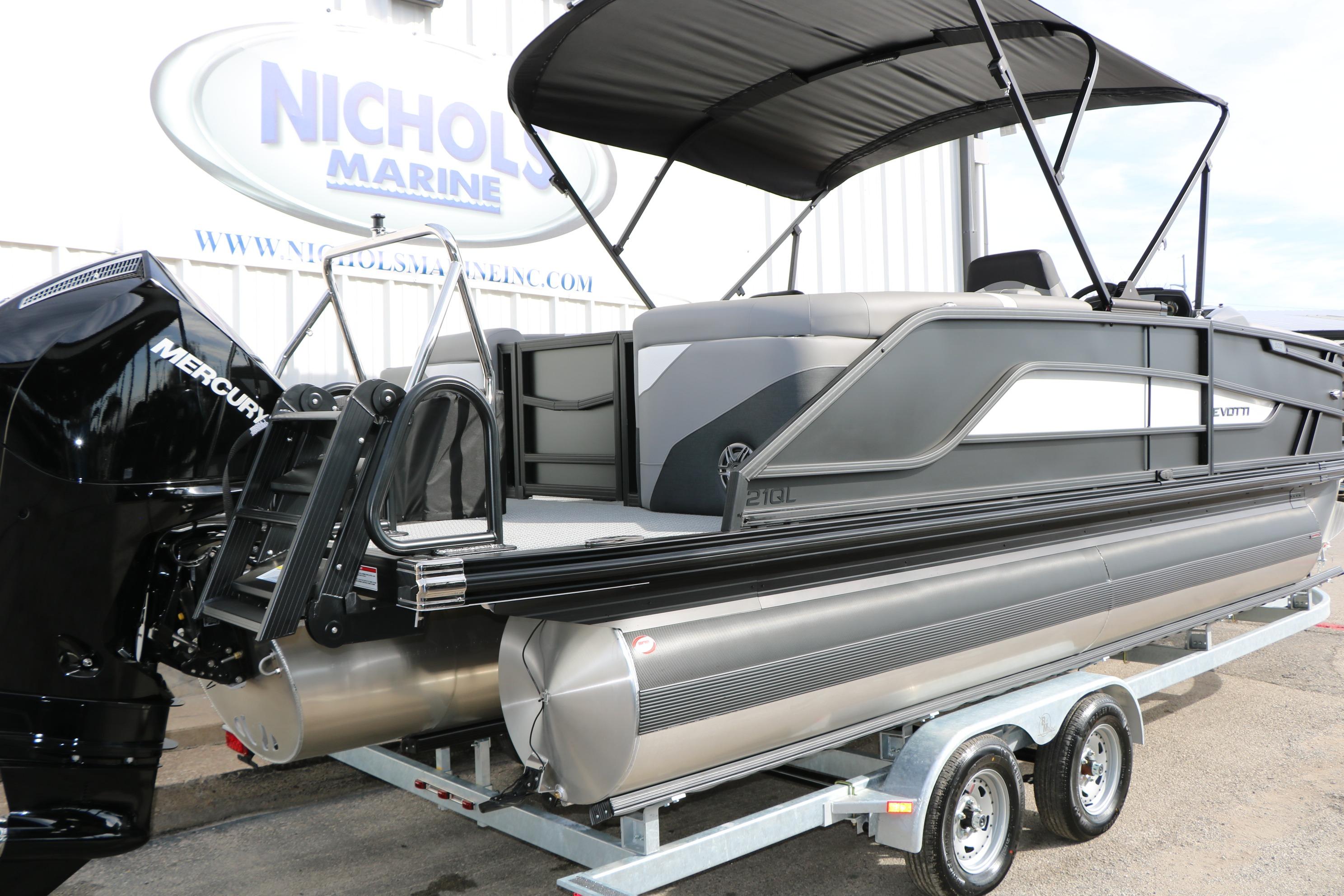 2026 Evotti 521QL pontoon boat on trailer at Nichols Marine dealership.
